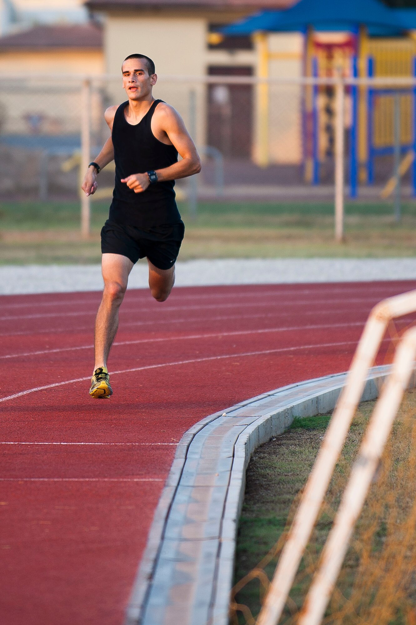 Staff Sgt. Joshua Acosta, 39th Logistics Readiness Squadron, runs during an Incirlik Running Club session at the track Aug. 10, 2011, at Incirlik Air Base Turkey. The Incirlik Running Club's overall goal is to prepare Airmen for Incirlik's Half Marathon and Istanbul's Marathon. (U.S. Air Force photo by Airman 1st Class Clayton Lenhardt/Released)
