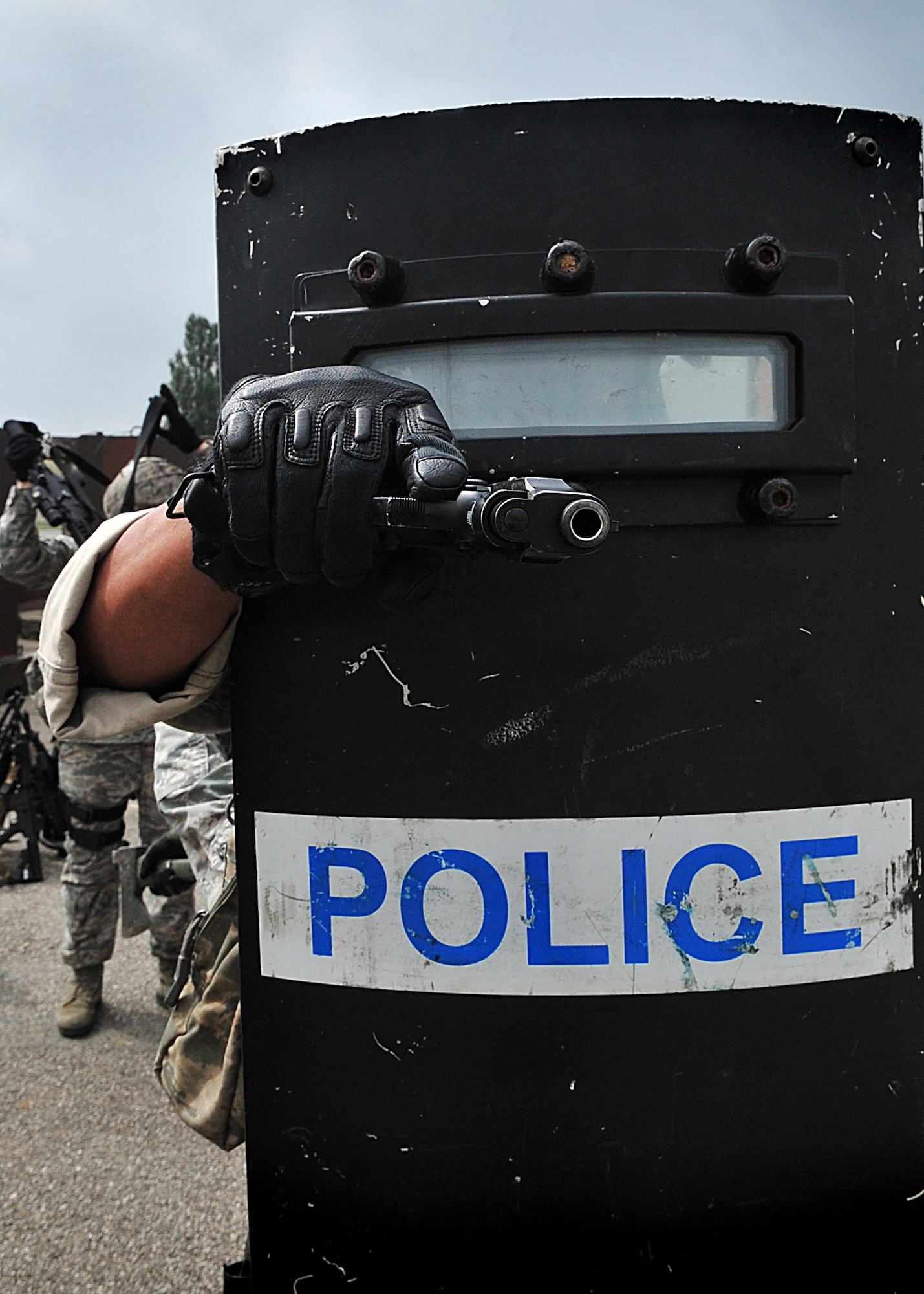 14 of the 27 Airman who volunteered, remain here, August 10. Day two and three of the QRT training, rigorous physical training continued as obstacles increased with difficulty testing [their] strength, hand-eye coordination and communications skills. SF Airmen were taught how to  breech/clear buildings  and received certification in the use of simulated ground burst projectiles.  Day four SF Airmen performe active shooter on a bus scenarios.  Physical training sessions were themed in memory of the 31 warriors lost in Afghanistan, August 7, by each volunteer completing 31 of each exercise throughout the course. A QRT member provides immediate response to any high risk situation on Osan Air Base to include barricaded suspects, workplace violence, domestic violence and abuse response, school violence, and disaster response.  (U.S. Air Force Photo by/Staff Sgt. Daylena Gonzalez)

