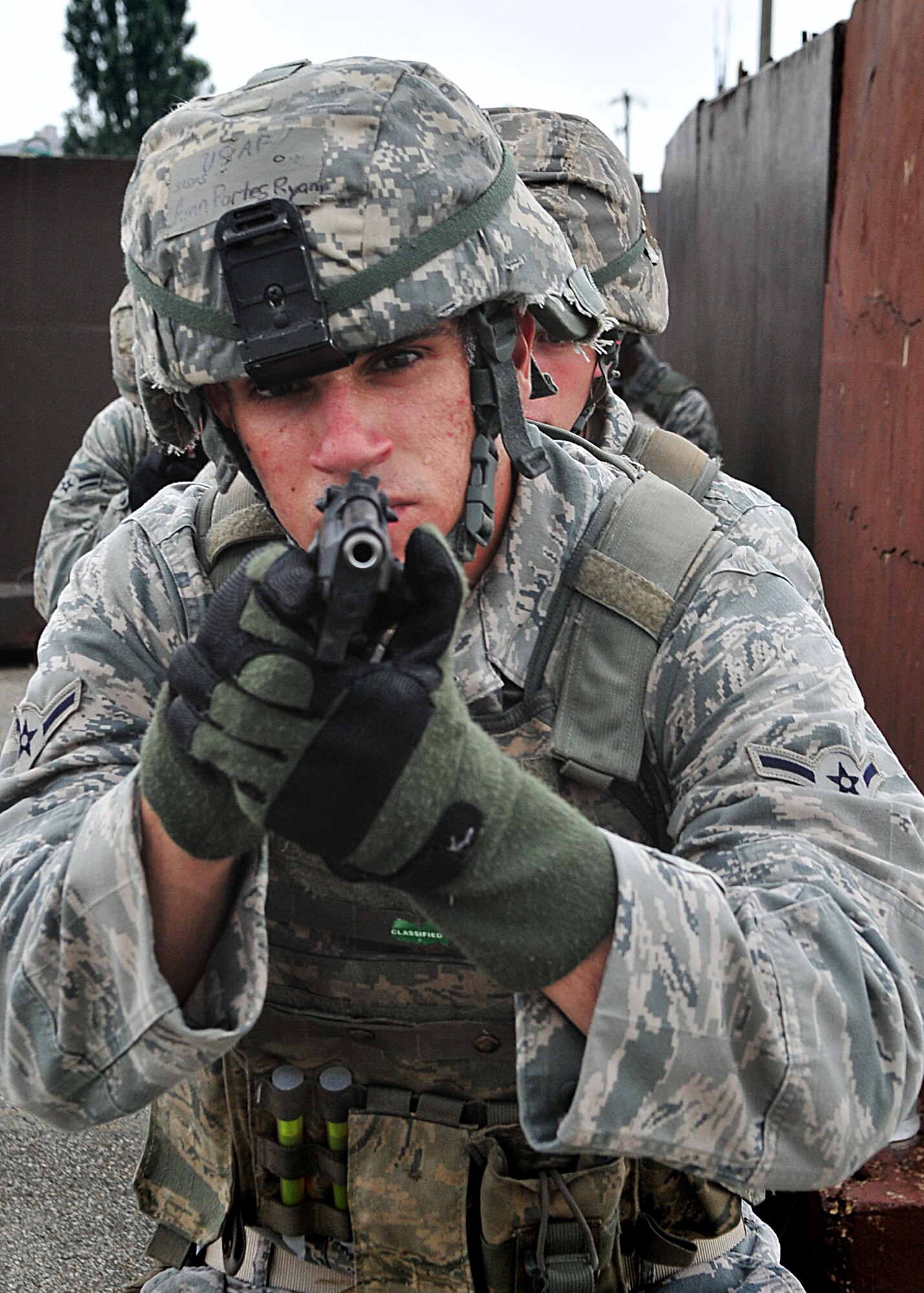 14 of the 27 Airman who volunteered, remain here, August 10. Day two and three of the QRT training, rigorous physical training continued as obstacles increased with difficulty testing [their] strength, hand-eye coordination and communications skills. SF Airmen were taught how to  breech/clear buildings  and received certification in the use of simulated ground burst projectiles.  Day four SF Airmen performe active shooter on a bus scenarios.  Physical training sessions were themed in memory of the 31 warriors lost in Afghanistan, August 7, by each volunteer completing 31 of each exercise throughout the course. A QRT member provides immediate response to any high risk situation on Osan Air Base to include barricaded suspects, workplace violence, domestic violence and abuse response, school violence, and disaster response.  (U.S. Air Force Photo by/Staff Sgt. Daylena Gonzalez)

