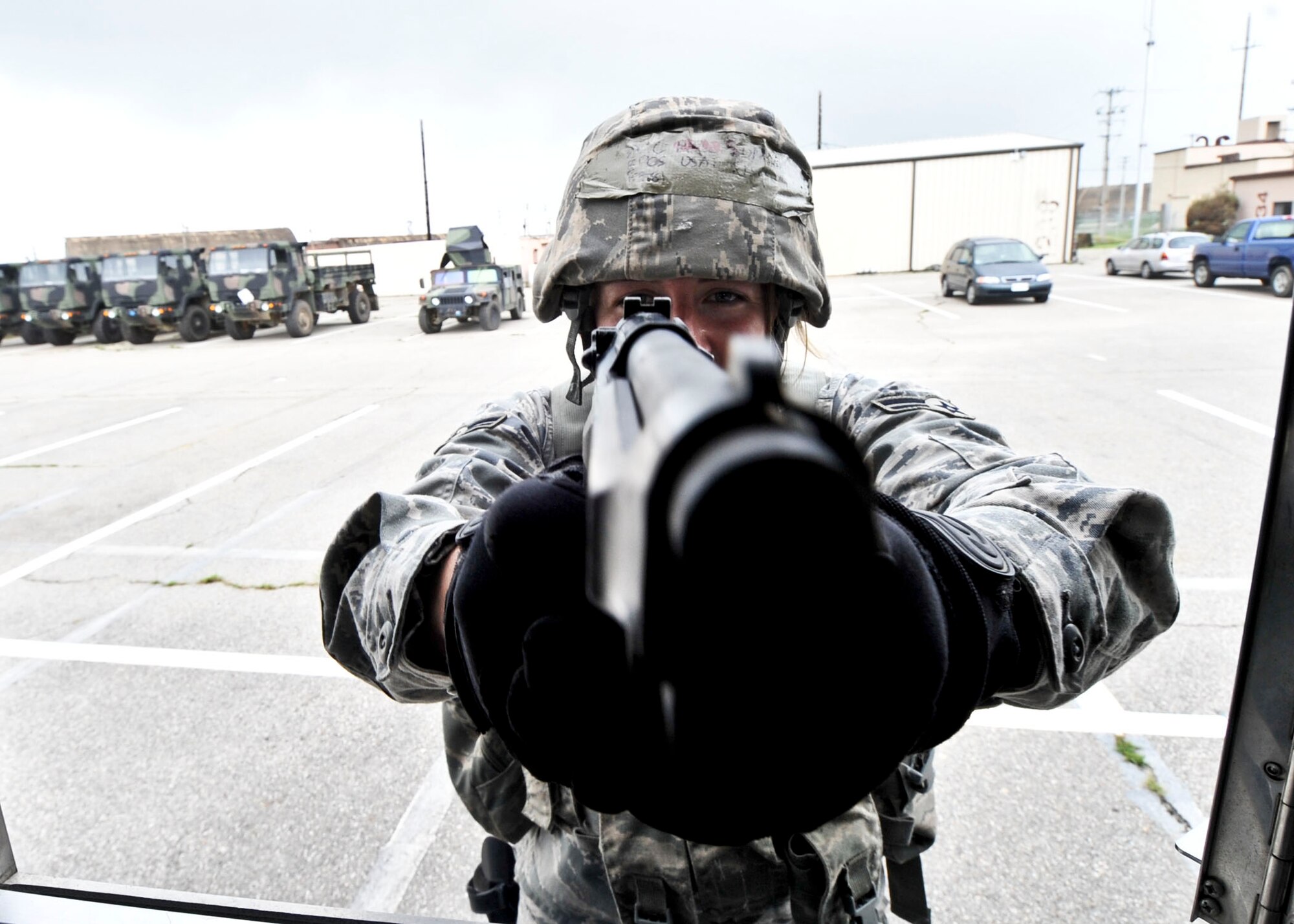14 of the 27 Airman who volunteered, remain here, August 10. Day two and three of the QRT training, rigorous physical training continued as obstacles increased with difficulty testing not only their strength but also their capabilities to act as a cohesive squad. SF Airmen were taught how to breech/clear buildings and received certification in the use of simulated ground burst projectiles. Day four SF Airmen performed active shooter scenarios on a bus.  Physical training sessions were themed in memory of the 31 warriors lost in Afghanistan, August 7, by each volunteer completing 31 of each exercise throughout the course. A QRT member provides immediate response to any high risk situation on Osan Air Base to include barricaded suspects, workplace violence, domestic violence and abuse response, school violence, and disaster response. (U.S. Air Force Photos by/ Senior Airman Adam Grant)