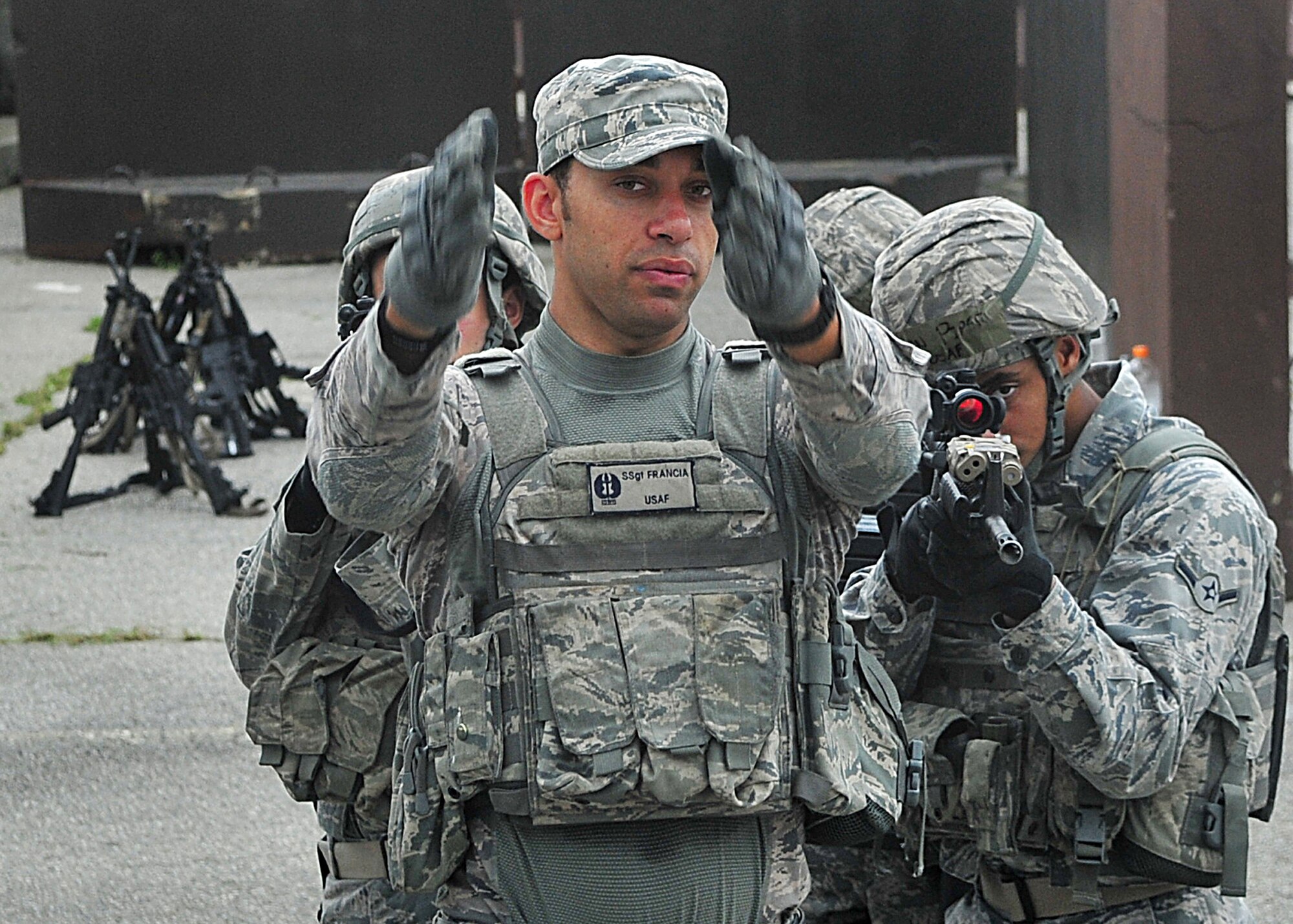 14 of the 27 Airman who volunteered, remain here, August 10. Day two and three of the QRT training, rigorous physical training continued as obstacles increased with difficulty testing [their] strength, hand-eye coordination and communications skills. SF Airmen were taught how to  breech/clear buildings  and received certification in the use of simulated ground burst projectiles.  Day four SF Airmen performe active shooter on a bus scenarios.  Physical training sessions were themed in memory of the 31 warriors lost in Afghanistan, August 7, by each volunteer completing 31 of each exercise throughout the course. A QRT member provides immediate response to any high risk situation on Osan Air Base to include barricaded suspects, workplace violence, domestic violence and abuse response, school violence, and disaster response.  (U.S. Air Force Photo by/Staff Sgt. Daylena Gonzalez)

