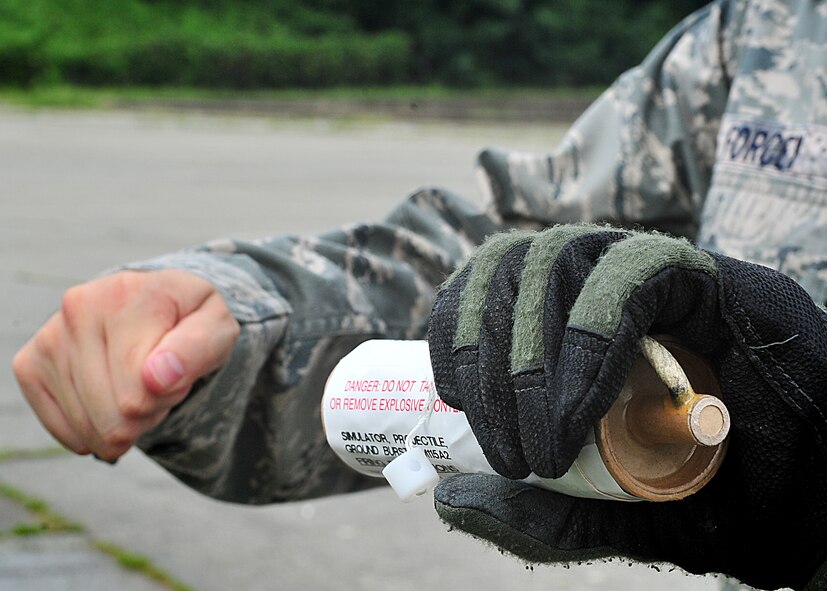 14 of the 27 Airman who volunteered, remain here, August 10. Day two and three of the QRT training, rigorous physical training continued as obstacles increased with difficulty testing [their] strength, hand-eye coordination and communications skills. SF Airmen were taught how to  breech/clear buildings  and received certification in the use of simulated ground burst projectiles.  Day four SF Airmen performe active shooter on a bus scenarios.  Physical training sessions were themed in memory of the 31 warriors lost in Afghanistan, August 7, by each volunteer completing 31 of each exercise throughout the course. A QRT member provides immediate response to any high risk situation on Osan Air Base to include barricaded suspects, workplace violence, domestic violence and abuse response, school violence, and disaster response.  (U.S. Air Force Photo by/Staff Sgt. Daylena Gonzalez)

