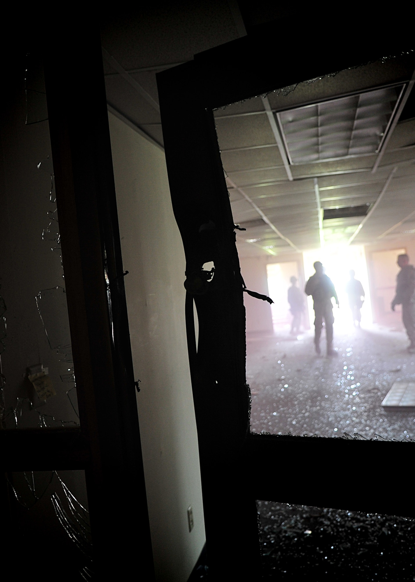 14 of the 27 Airman who volunteered, remain here, August 10. Day two and three of the QRT training, rigorous physical training continued as obstacles increased with difficulty testing [their] strength, hand-eye coordination and communications skills. SF Airmen were taught how to  breech/clear buildings  and received certification in the use of simulated ground burst projectiles.  Day four SF Airmen performe active shooter on a bus scenarios.  Physical training sessions were themed in memory of the 31 warriors lost in Afghanistan, August 7, by each volunteer completing 31 of each exercise throughout the course. A QRT member provides immediate response to any high risk situation on Osan Air Base to include barricaded suspects, workplace violence, domestic violence and abuse response, school violence, and disaster response.  (U.S. Air Force Photo by/Staff Sgt. Daylena Gonzalez)

