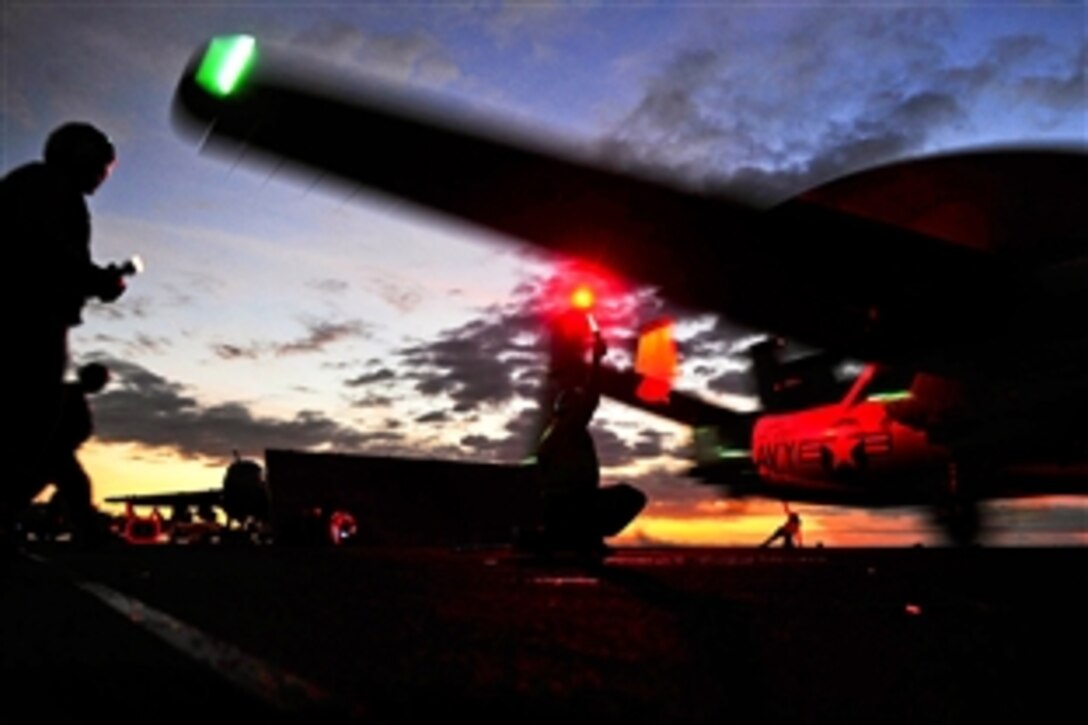 An E-2C Hawkeye launches from the aircraft carrier USS John C. Stennis in the Pacific Ocean, Aug. 9, 2011. The John C. Stennis Carrier Strike Group is on a scheduled deployment to the western Pacific Ocean and Arabian Gulf. The Hawkeye is assigned to Airborne Early-Warning Squadron 112.