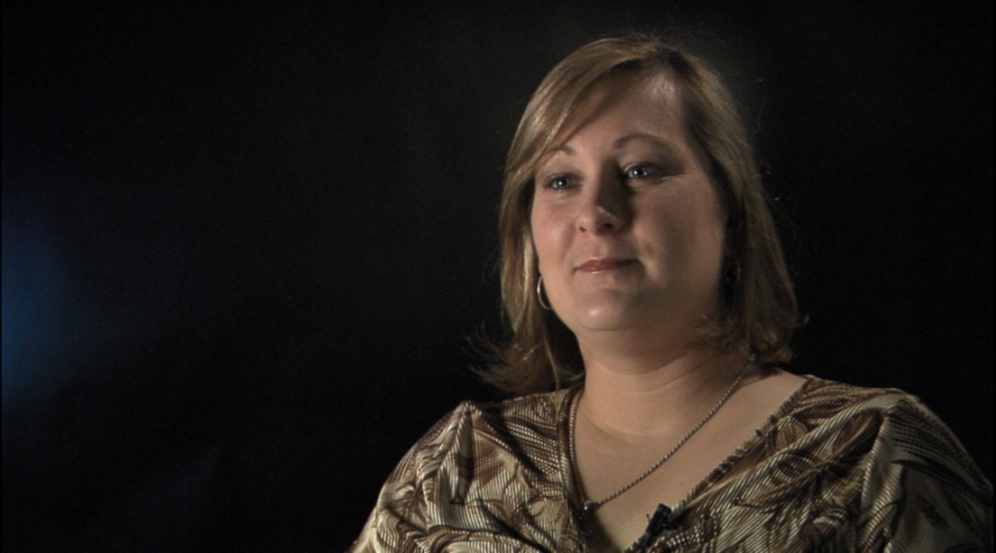 DAVIS-MONTHAN AIR FORCE BASE, Ariz. – Mrs. Tanya Campbell, a military spouse, former active duty Airman and reservist, tells the story of being away from her deployed husband during the attacks on Sept. 11. (Courtesy photo)