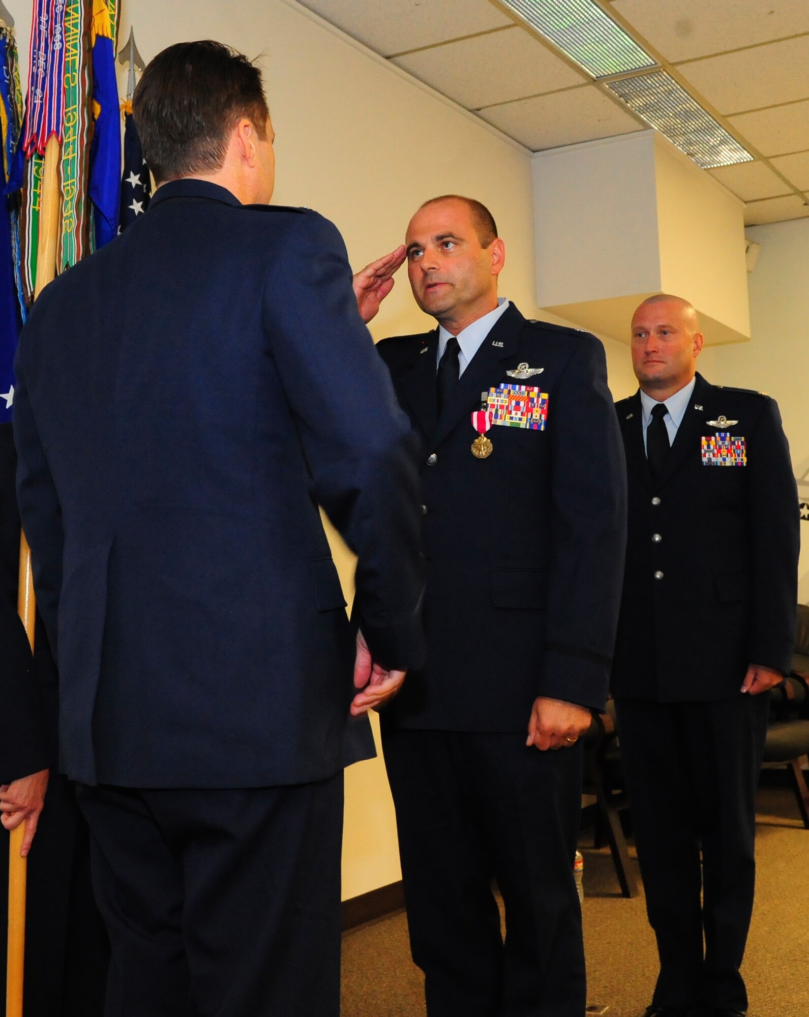 Lt. Col. Kent Furman relinquished command of the 301st Fighter Squadron during a change of command ceremony here August 7, but will continue to be a part of the 44th Fighter Group. Lt. Col. Scott Crogg, 44th Fighter Group commander, presided. (U.S. Air Force Photo by SrA Martha Whipple, 44th Fighter Group Public Affairs)