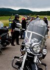 Participants of the 2011 Dakota Thunder Motorcycle Run stop to rest and regroup before the last stretch of their ride into Sturgis, S.D., Aug. 9, 2011. A B-1B Lancer performed a flyover at the culmination of the special military appreciation event. (U.S. Air Force photo/Airman Alystria Maurer/Released)