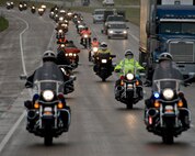 The participants in the 2011 Dakota Thunder Motorcycle Run ride down Interstate 90 on their way to Sturgis, S.D., Aug. 9, 2011. More than 200 Ellsworth Airmen, veterans, and police officers traveled through the Black Hills to Sturgis, S.D. for this year’s Dakota Thunder Motorcycle Run. (U.S. Air Force photo/Airman Alystria Maurer/Released)