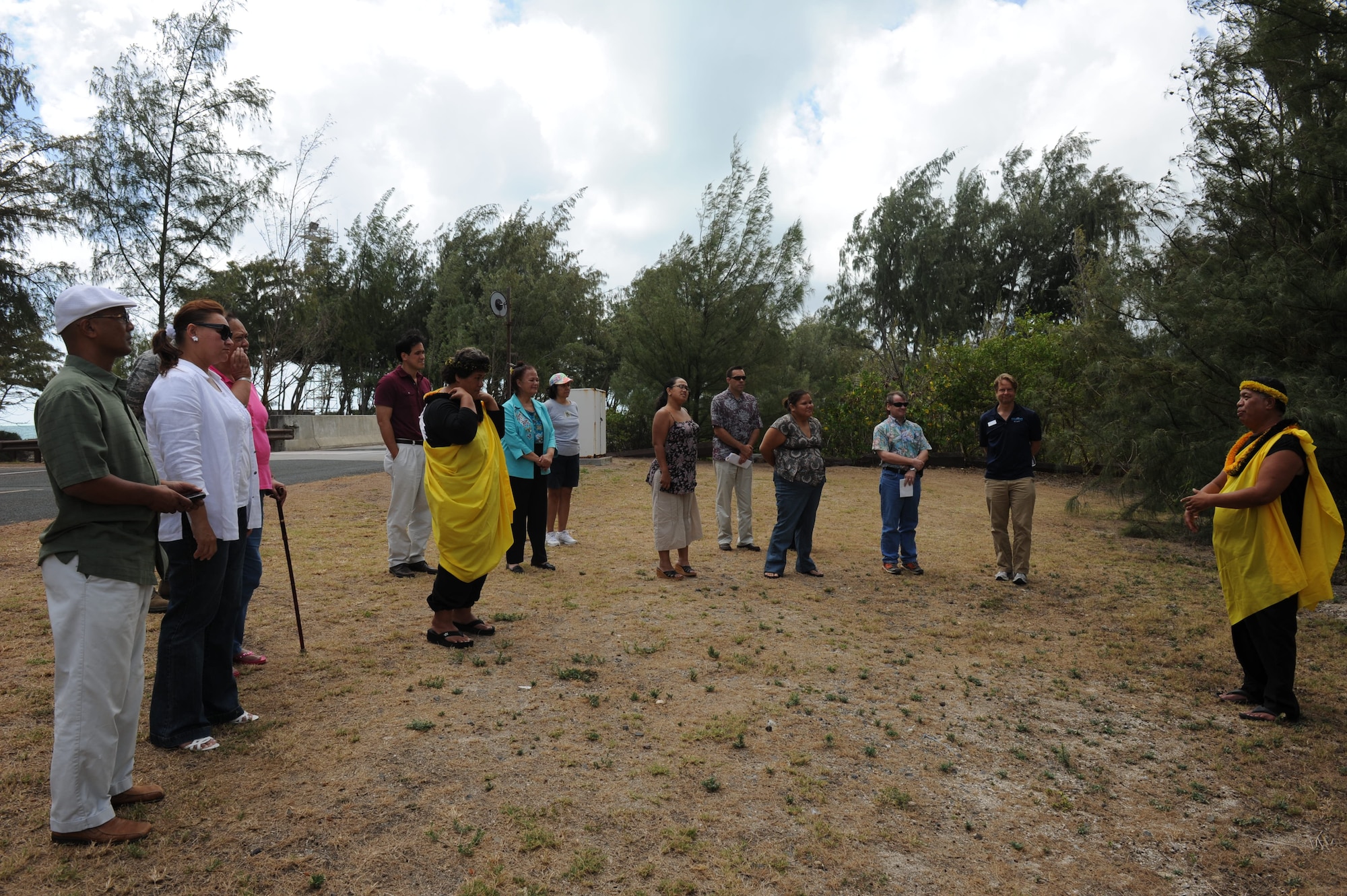 BELLOWS AIR FORCE STATION, Hawaii – Kahu Kalama briefs about the burial site during the Bellows Air Force Station Site Visit here, Aug. 11.  The tour was given to local leaders of the community, including Senator Pohai Ryan, to give a better understanding of the military training mission at Bellows AFS. (U.S. Air Force photo/Staff Sgt. Gustavo Gonzalez)