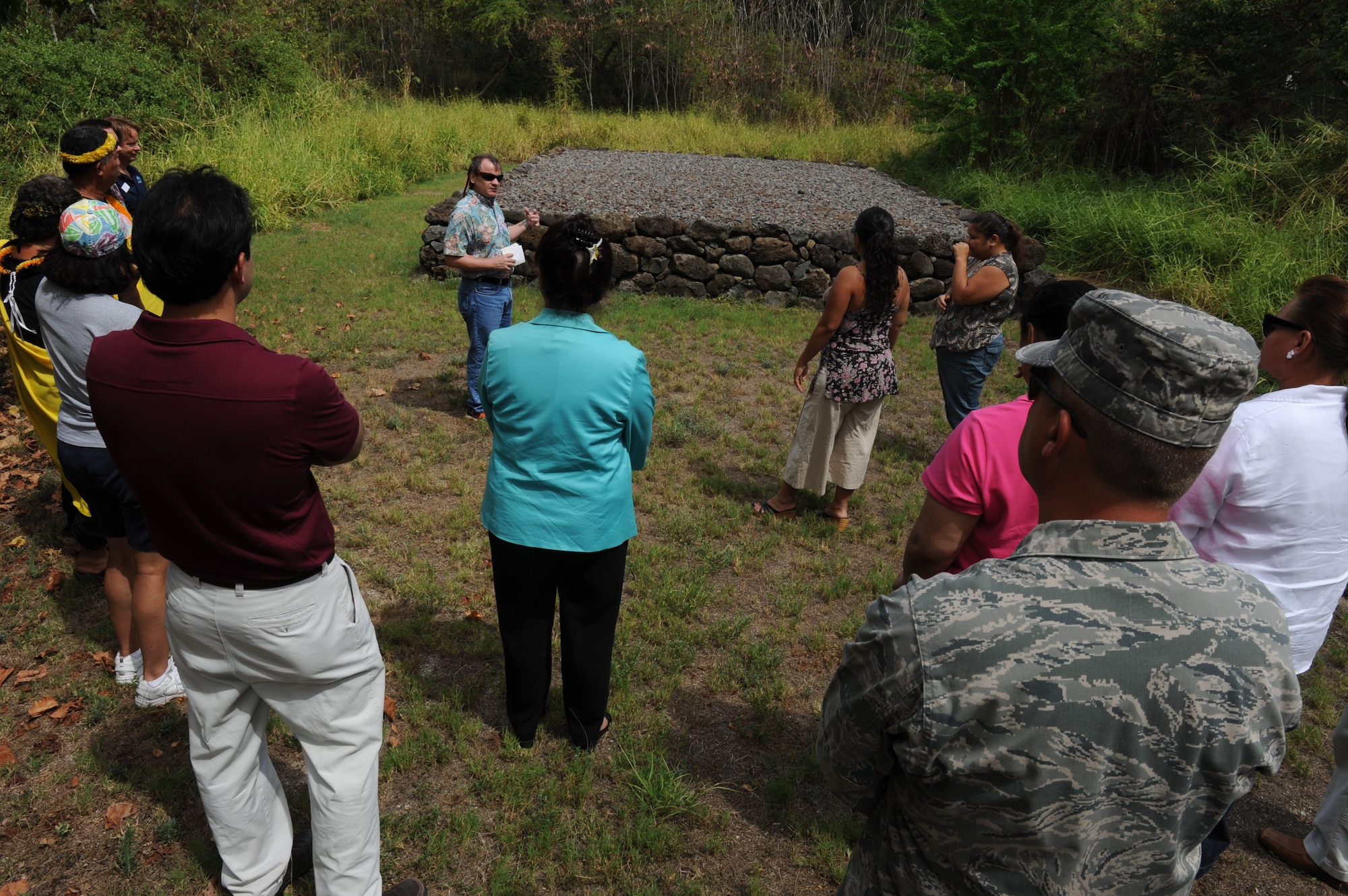 BELLOWS AIR FORCE STATION, Hawaii – Jeff Pantaleo, NAVFAC archaeologist, talks about the burial site during the Bellows Air Force Station Site Visit here, Aug. 11.  The tour was given to local leaders of the community, including Senator Pohai Ryan, to give a better understanding of the military training mission at Bellows AFS. (U.S. Air Force photo/Staff Sgt. Gustavo Gonzalez)