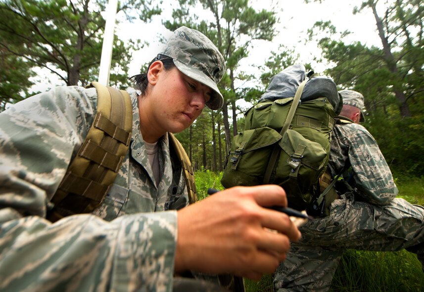 U.S. Air Force 1st Lt. Jessica Terrell, 1st Special Operations Maintenance Squadron munitions accountable systems officer from Hurlburt Field, Fla., takes down coordinates during a land navigation exercise for the air liaison officer (ALO) training course at Moody Air Force Base, Ga., Aug. 2, 2011. ALO training is a preliminary course that prepares Air Force officers and cadets for the ALO school they’ll attend at the end of training. (U.S. Air Force photo by Airman 1st Class Joshua Green/Released)
