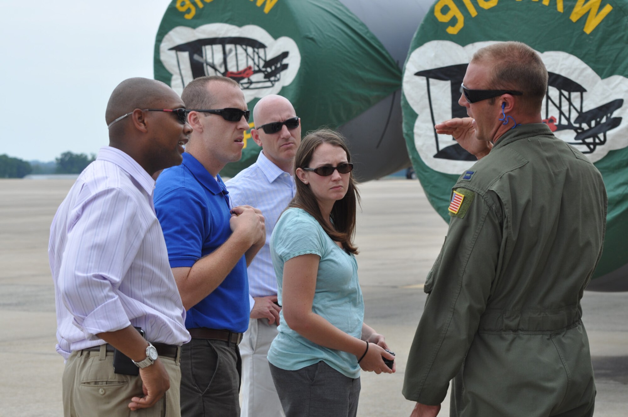 Capt. Thomas Weber, pilot with the 911th Air Refueling Squadron, shows congressional staffers a KC-135R Stratotanker during a visit here on Aug. 11, 2011. (USAF photo by Maj. Shannon Mann, 916ARW/PA)