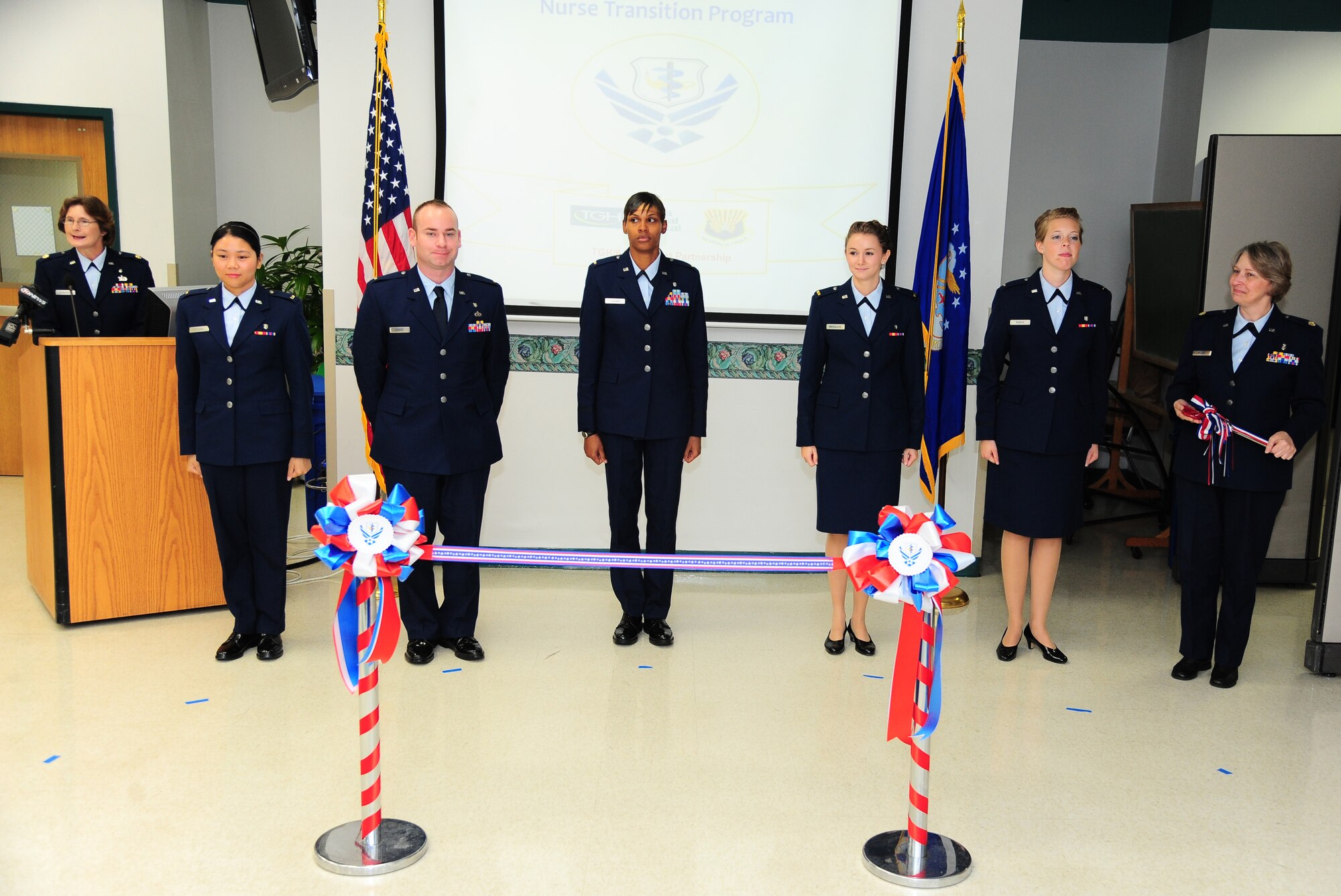 The first Nurse Transition Program class at Tampa General Hospital participates in a ribbon-cutting ceremony, Aug 3. (U.S. Air Force photo by Airman Basic David Tracy)