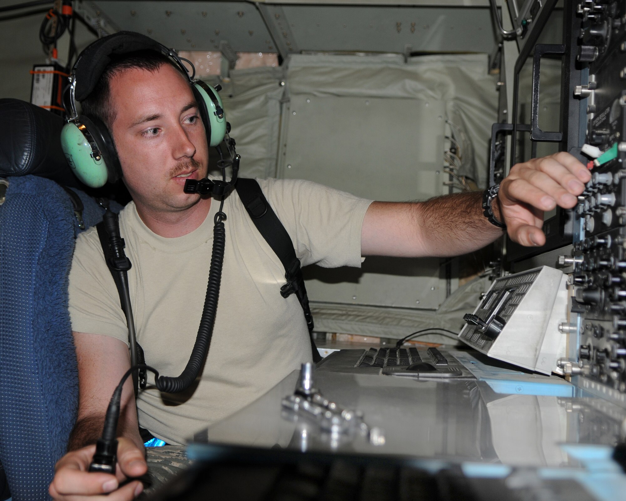 BAGRAM AIRFIELD, Afghanistan -- Staff Sgt. Mathew Wilkinson, 455th Expeditionary Aircraft Maintenance Squadron hydraulics craftsman, checks for bleed on the communications system on an EC-130 Compass Call aircraft here August 11, 2011. Wilkinson and other Airman from EAMXS help each other get the mission done by learning how to perform jobs outside their normal scope of operations. Wilkinson is stationed at Davis-Monthan Air Force Base, Ariz. (U.S. Air Force photo/Senior Airman
Krista Rose)
