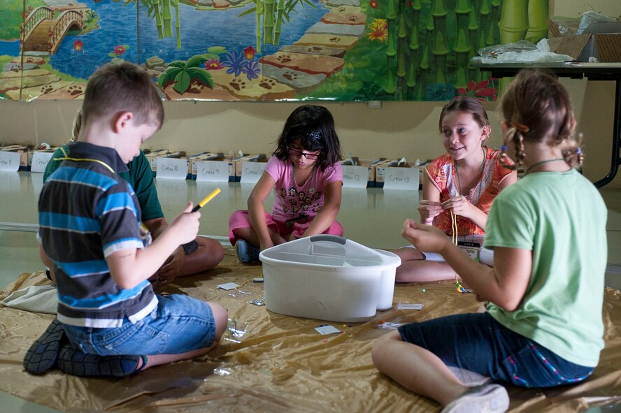 A group of children attending PandaMania Vacation Bible School work on arts and crafts Aug. 11, 2011, at Incirlik Air Base, Turkey. VBS was held Aug. 8-12 and is an annual event that provides a fun way for children to reinforce their religious teachings. (U.S. Air Force photo by Airman 1st Class Clayton Lenhardt/Released)