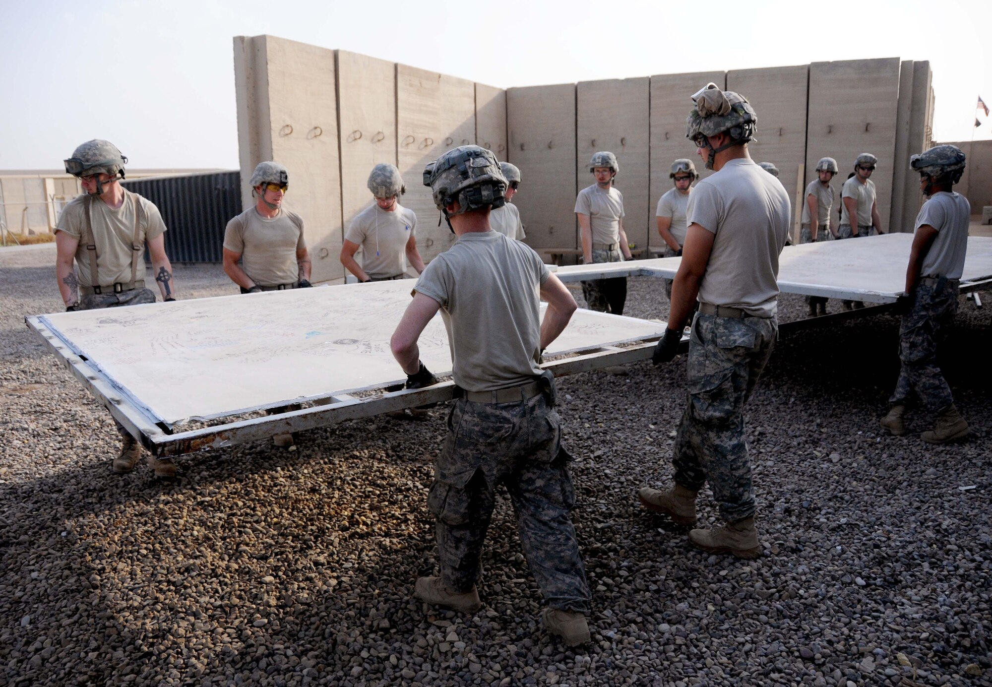 The 389th Engineer Company from Armed Forces Reserve Center, Iowa, cut, grind and saw sheetrock and metal beams to remove the 332nd Expeditionary Medical Group Contingency Aeromedical Staging Facility walls from Joint Base Balad, Iraq. The walls will be moving to National Museum of the U.S. Air Force in Wright Patterson Air Force Base, Ohio. (U.S. photo by Senior Airman Jeffrey Schultze)

