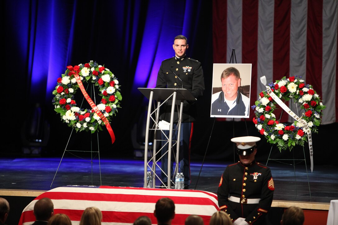 Pastor Miles McPherson gives words of encouragement during the memorial ceremony of Officer Jeremy Henwood in San Diego, Aug. 12. Henwood, a Marine reserve officer, was posthumously promoted to the rank of major after being killed in the line of duty serving with the San Diego Police Department, Aug. 7.