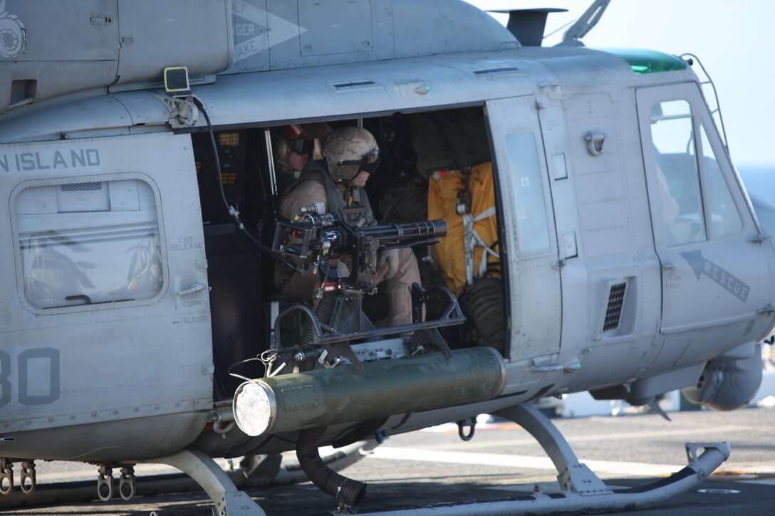 A CH-46E Sea Knight with the 11th Marine Expeditionary Unit's aviation combat element flies onto USS Makin Island Aug. 12. The unit began a seagoing exercise off the coast of Southern California Aug. 10 -- its first at-sea period since becoming a complete Marine air ground task force in May.