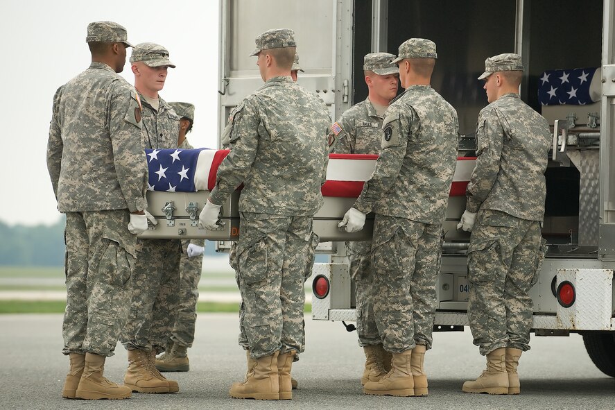 A U.S. Army carry team transfers the remains of Army Pfc. Rueben J. Lopez, of Williams, Calif., at Dover Air Force Base, Del., Aug. 13, 2011. Lopez  was assigned to the 1st Battalion, 32nd Infantry Regiment, 3rd Brigade Combat Team, 10th Mountain Division, Fort Drum, N.Y. (U.S. Air Force photo/Steve Kotecki)
