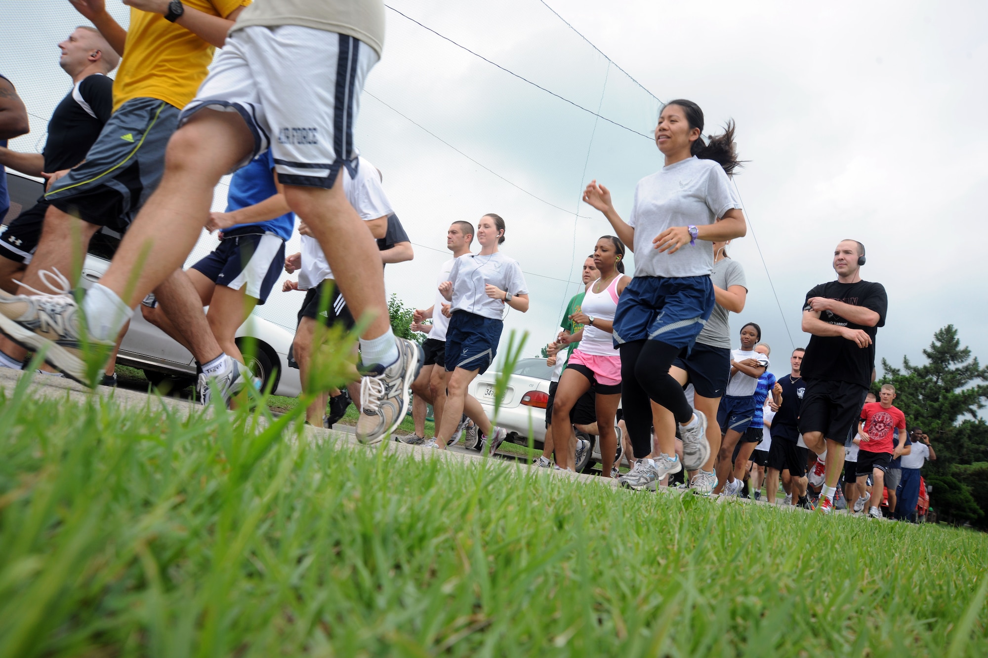 KUNSAN AIR BASE, Republic of Korea -- Airmen participate in a 5K run during the Kunsan vs Osan sports day here Aug. 12. Airmen from both bases competed in different sports including basketball, football, volleyball and soccer. (U.S. Air Force photo/Senior Airman Brittany Y. Bateman)