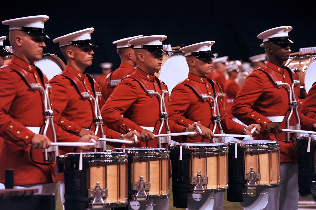 The U.S. Marine Drum and Bugle Corps performs at the opening of the Drum Corps International World Championships at the Lucas Oil Stadium in Indianapolis, Aug. 13, 2011. The event featured world-class drum and bugle corps organizations from all over the country and abroad, each of which traveled more than 10,000 miles over the course of the summer while performing at more than 35 sanctioned events.