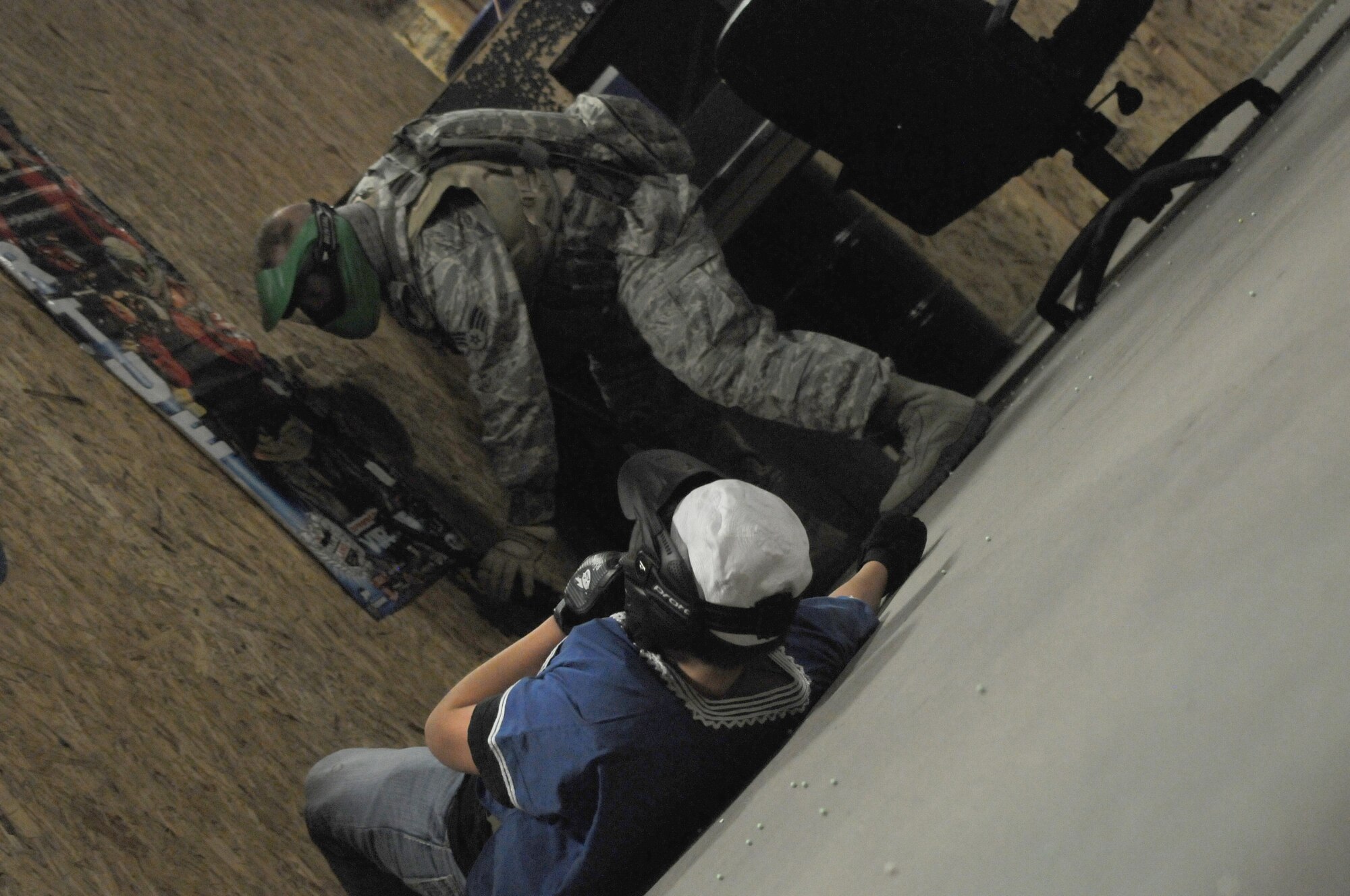 Airmen from the 161st Air Refueling Wing Security Forces Squadron received  close quarters tactic training at a local airsoft course in Gilbert Ariz., August 13, 2011. The training facility provides several real world scenarios in an urban enviroment to prepare Airmen for combat. (Released/ U.S. Air Force A1C Rashaunda Williams.)