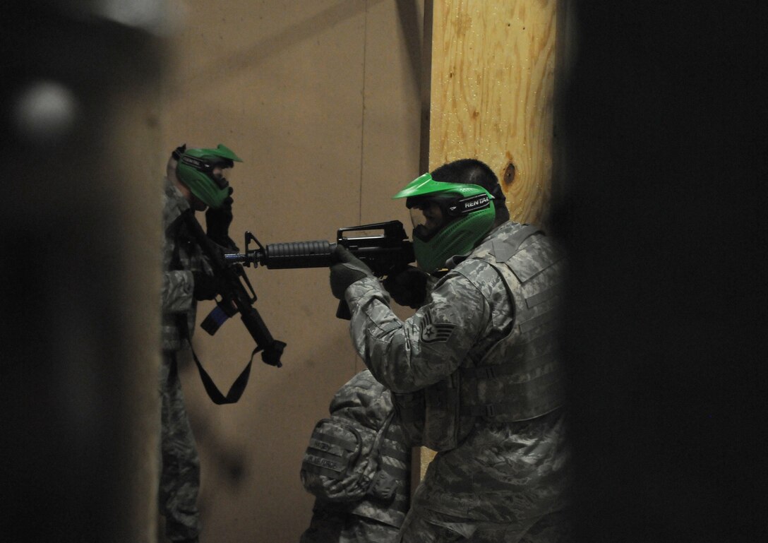 Airmen from the 161st Air Refueling Wing Security Forces Squadron received  close quarters tactic training at a local airsoft course in Gilbert Ariz., August 13, 2011. The training facility provides several real world scenarios in an urban enviroment to prepare Airmen for combat. (Released/ U.S. Air Force A1C Rashaunda Williams.)