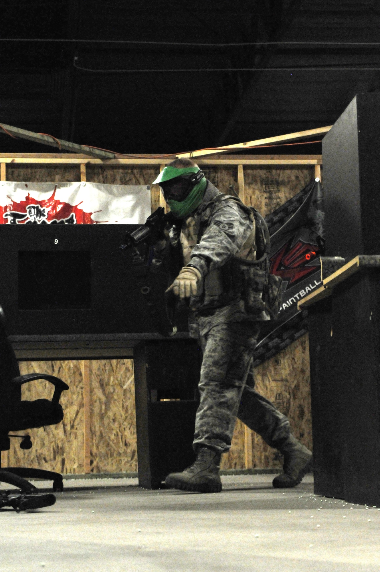 Airmen from the 161st Air Refueling Wing Security Forces Squadron received  close quarters tactic training at a local airsoft course in Gilbert Ariz., August 13, 2011. The training facility provides several real world scenarios in an urban enviroment to prepare Airmen for combat. (Released/ U.S. Air Force A1C Rashaunda Williams.)