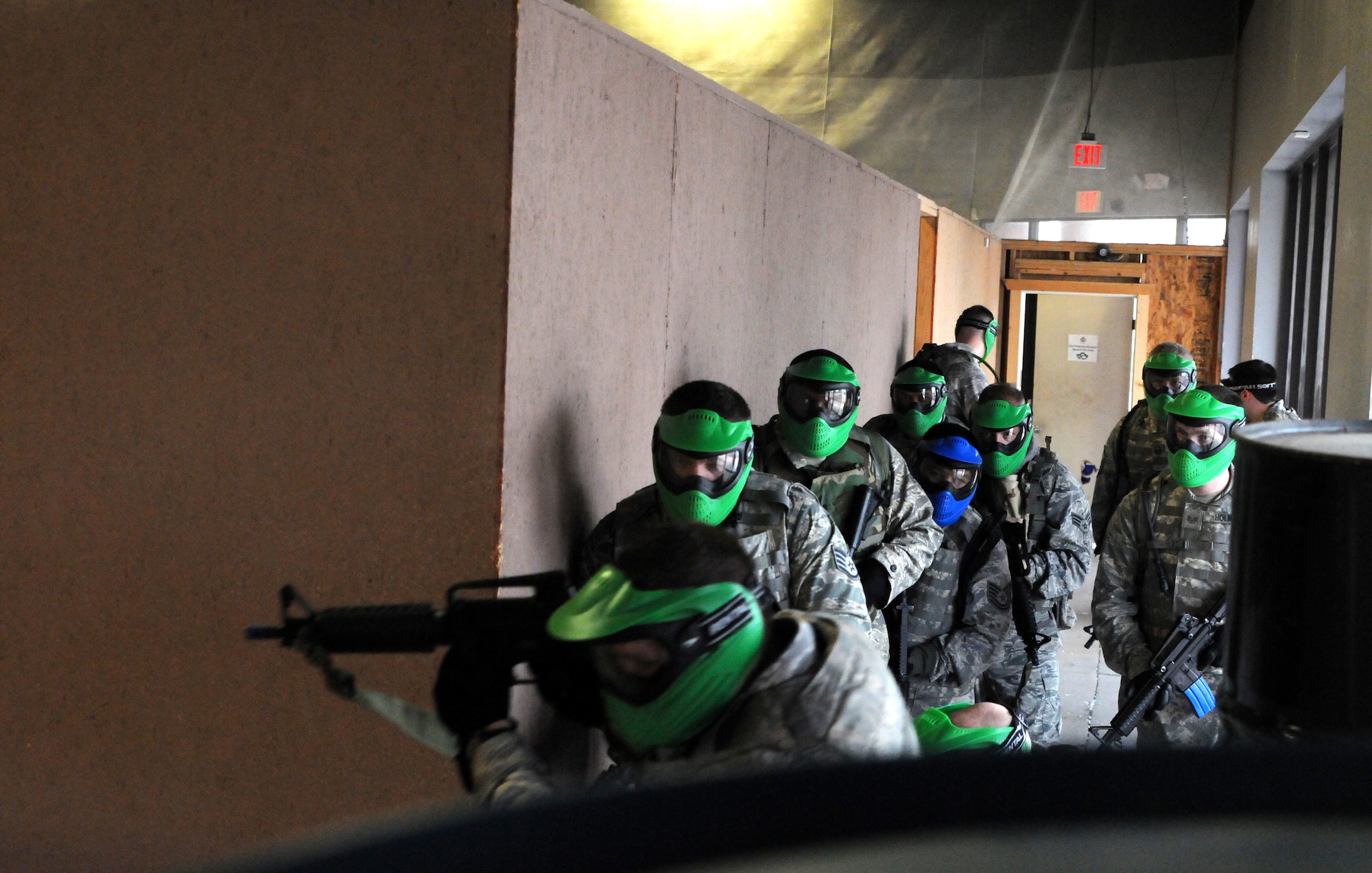 Airmen from the 161st Air Refueling Wing Security Forces Squadron received  close quarters tactic training at a local airsoft course in Gilbert Ariz., August 13, 2011. The training facility provides several real world scenarios in an urban enviroment to prepare Airmen for combat. (Released/ U.S. Air Force A1C Rashaunda Williams.)