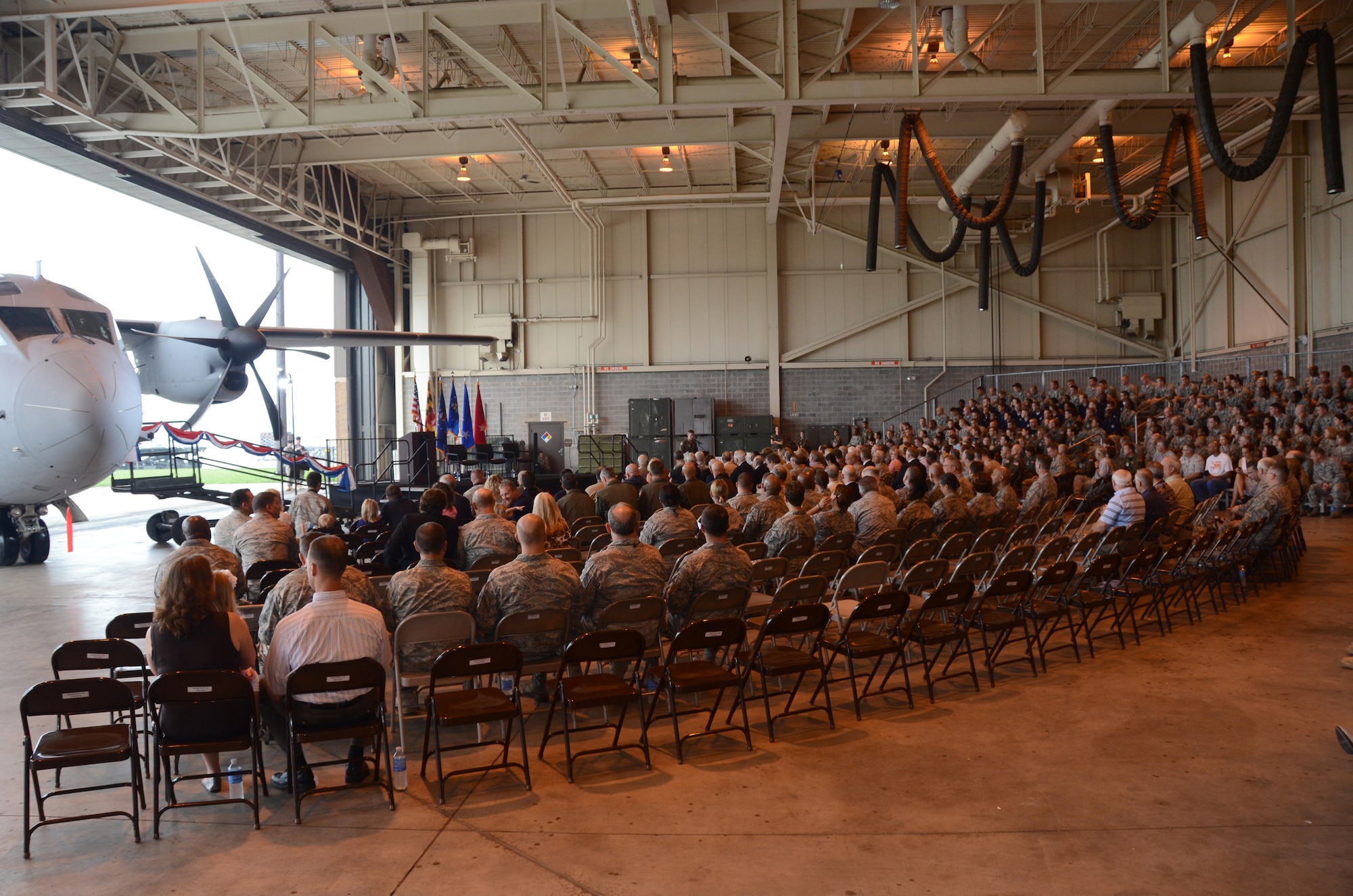Members of the 175th Wing and distinguished visitors and community supporters celebrate the arrival of the C-27J Spartan on August 13, 2011 at Warfield Air National Guard base, Baltimore, MD.  The arrival of the C-27J Spartan marks the transition from the C-130J Hercules which had been with the Maryland Air Guard since 1999.  (U.S. Air Force photo by Technical Sgt. Christopher Schepers/RELEASED)