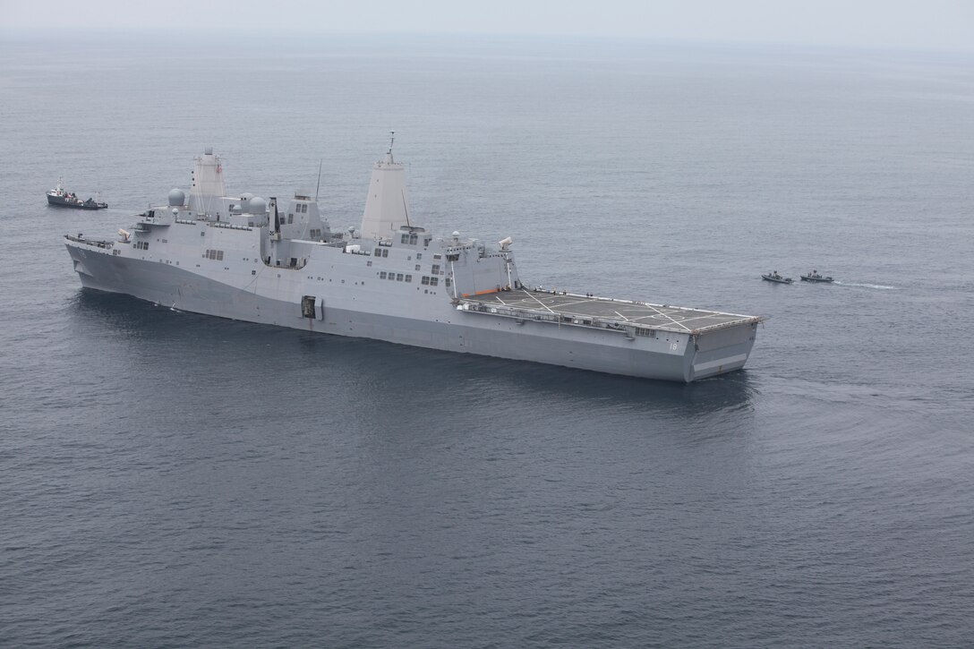 The amphibious transport dock New Orleans chases a vessel during counter-piracy and counter-terrorism training Aug. 14 miles from Southern California's San Clemente Island. The 11th Marine Expeditionary Unit embarked the amphibious assault ship Makin Island and the amphibious transport dock New Orleans in San Diego and sailed Aug. 10 to begin its first seagoing exercise since becoming a complete Marine air-ground task force in May.