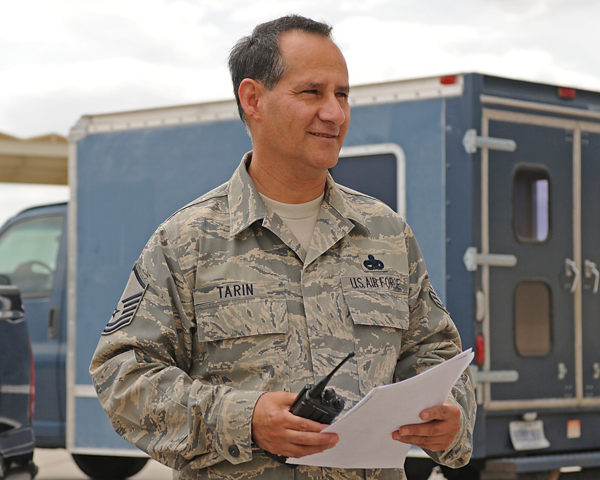 Master Sgt. Mark Tarin, avionics supervisor, 195th Aircraft Maintenance Unit, briefs his swing-shift crew before starting work Aug. 15, 2011.