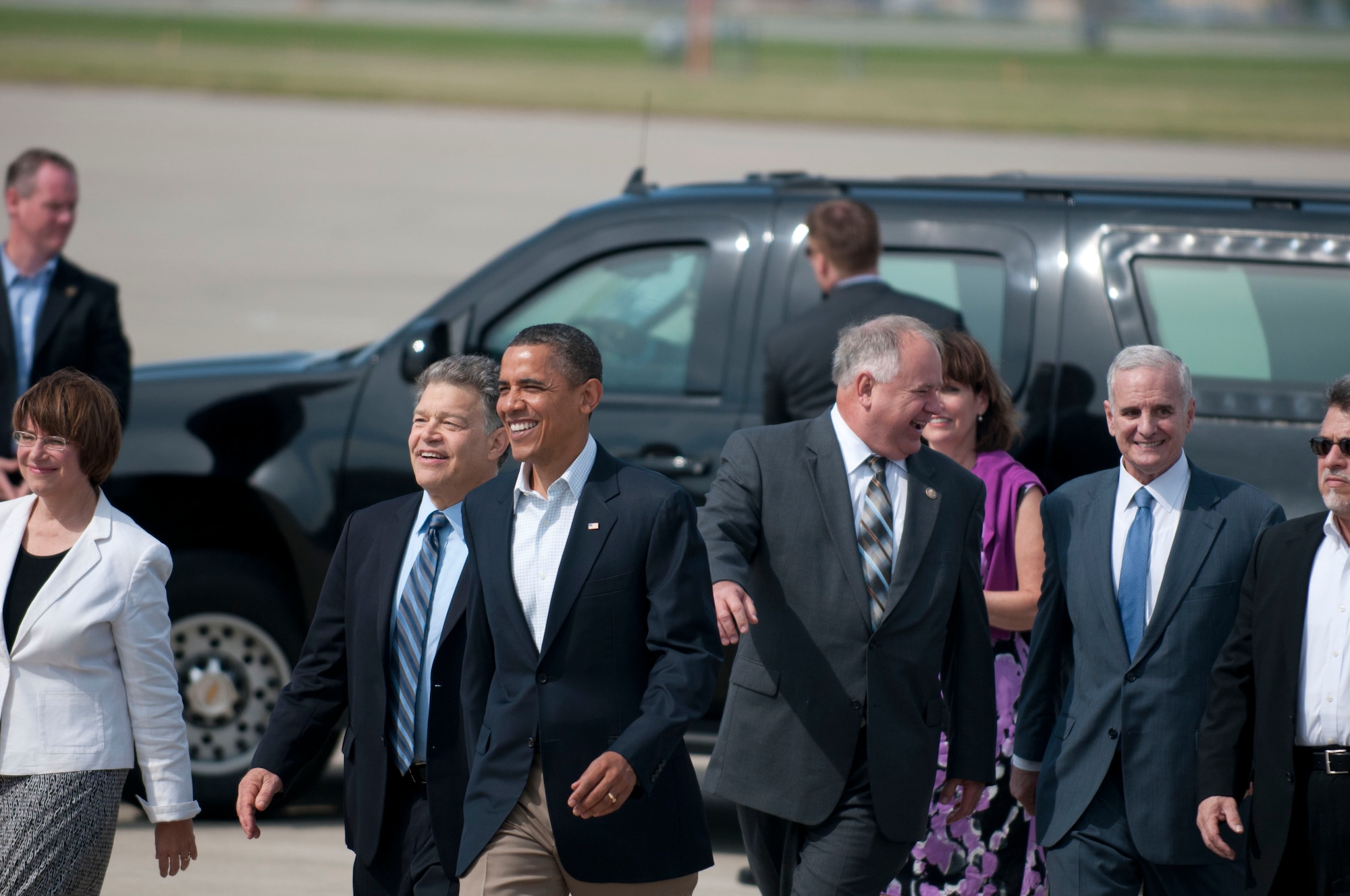 MINNEAPOLIS/ST. PAUL INTERNATIONAL AIRPORT –President Barrack Obama heads to say hello to members of the 133rd Airlift Wing and invited guests along with Sen. Amy Klobuchar, Sen. Al Frankin, Congressman Tim Walz, Congresswoman Betty McCollum, and Gov. Mark Dayton as he arrived here to start a three-day bus tour through Minn., Iowa, and Ill. (USAF official photo by Senior Airman Jonathan Young)