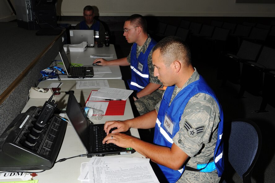 Members of the 124th Fighter Wing Personnel Deployment Function team update documents for mobility training on August 6, during the Operational Readiness Exercise at Gowen Field, Boise, Idaho.  (U.S. Air Force photo by Tech. Sgt. Becky Vanshur)