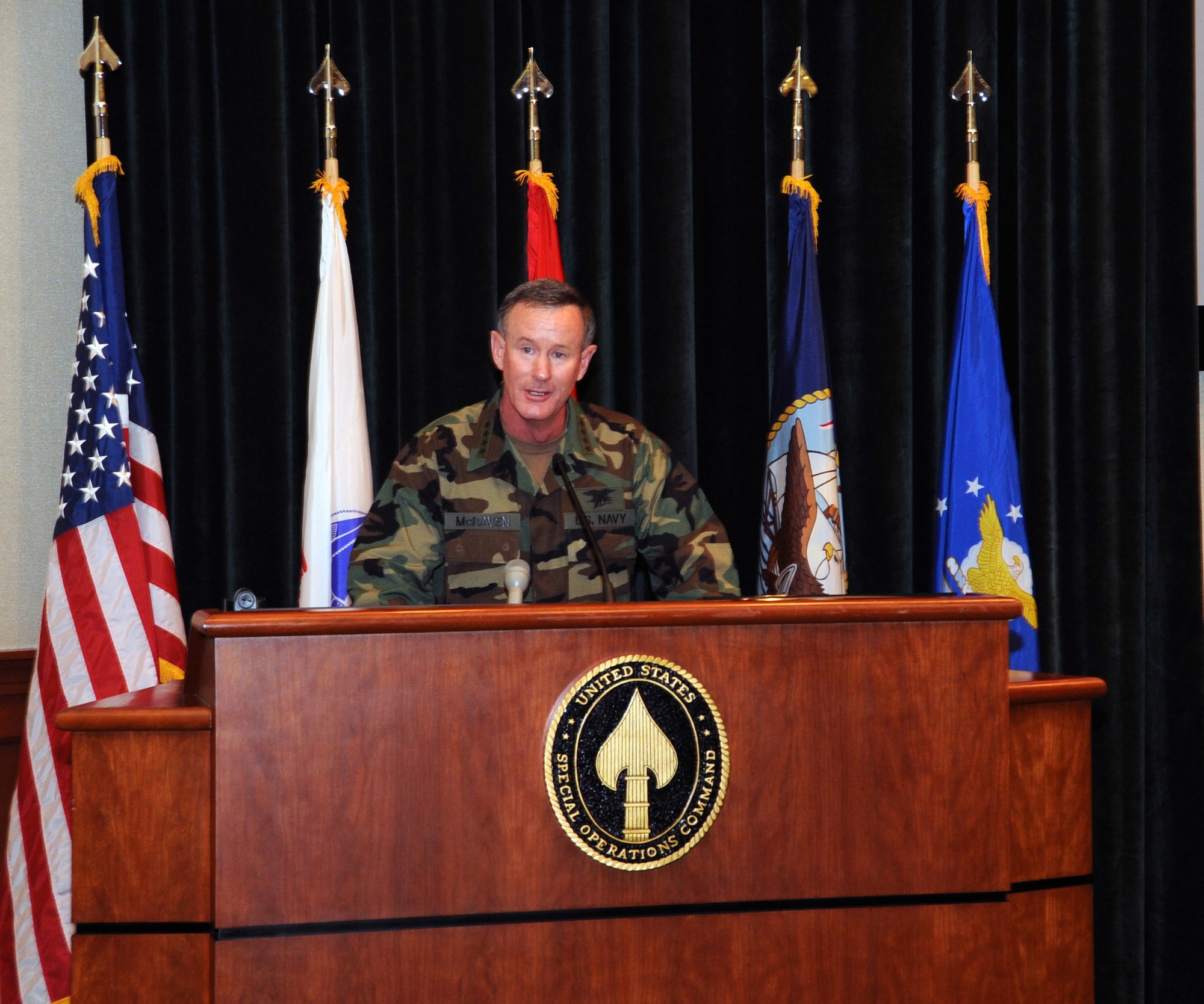 Adm. William H. McRaven gives remarks during the U.S. Special Operations Command change of command ceremony held at the Davis Conference Center, MacDill Air Force Base, Fla., Aug. 8. McRaven assumed command from Adm. Eric T. Olson and is the ninth commander of USSOCOM. (US Special Operations Command photo by Mike Bottoms)