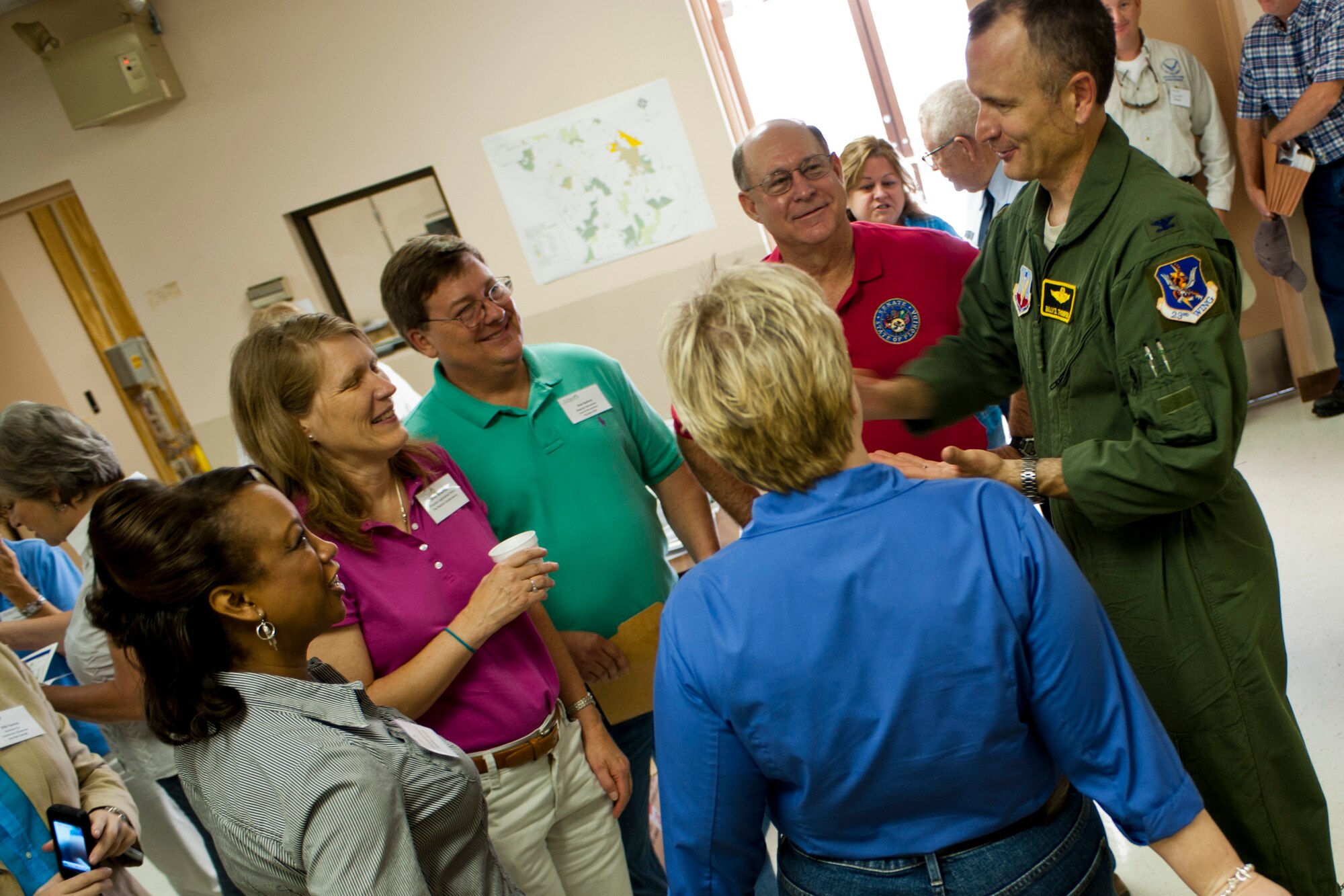 U.S. Air Force Col. Billy Thompson, 23rd Wing commander from Moody Air Force Base, Ga.,  right, talks to a group of people during his first visit to Avon Park Air Force Range, Fla., Aug. 2, 2011. Thompson is responsible for APAFR’s Deployed Training Complex, Air Combat Command’s largest air-to-ground and ground-to-ground training facility east of the Mississippi River. (U.S. Air Force photo by Andrea Thacker/Released)
