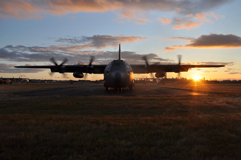 A C-130H Hercules from the Air Force Reserve Command’s 302nd Airlift Wing starts its engines in preparation for a personnel airdrop during the 2011 Air Mobility Rodeo at Joint Base Ft. Lewis-McChord. The 302nd Airlift Wing’s Rodeo team left the competition with first place recognition in: Best Short Field Landing Aircrew, Best Aeromedical C-17 Configuration Team and Best Aeromedical KC-135 Configuration Team. (U.S. Air Force photo/Capt. Corinna Jones)