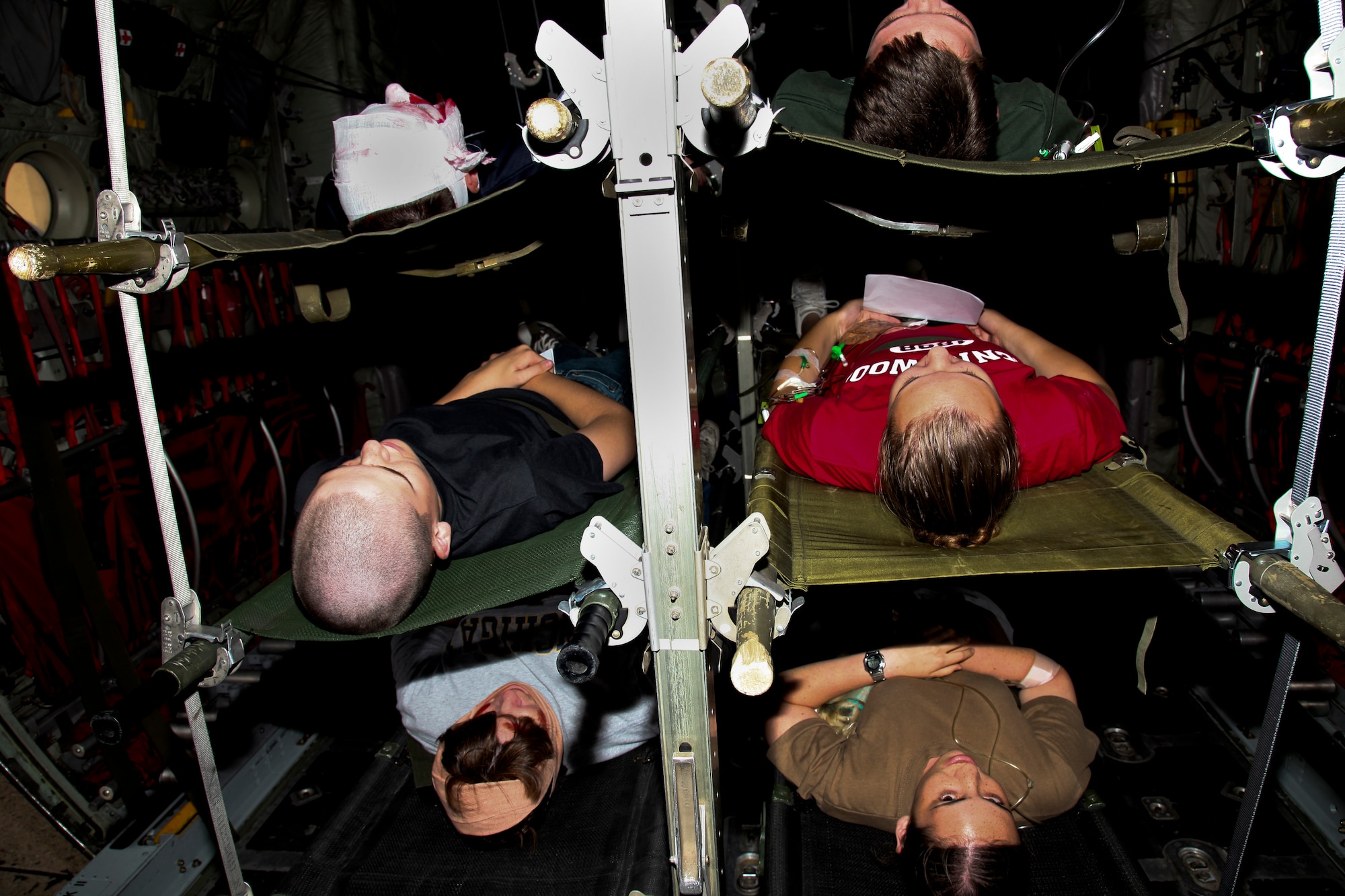 PITTSBURGH IAP ARS, PA -- Members of the Civil Air Patrol Golden Triangle Squadron 603 act as victims a hurricane laying in a C-130H awaiting evacuation during a National Disaster Medical System(NDMS) exercise, Aug. 13. The NDMS is a cooperative effort of the Department of Veterans Affairs, Department of Health and Human Services, Department of Defense, Federal Emergency Management Agency, state and local governments and the private sector. (U.S. Air Force photo/Senior Airman Joshua J. Seybert)