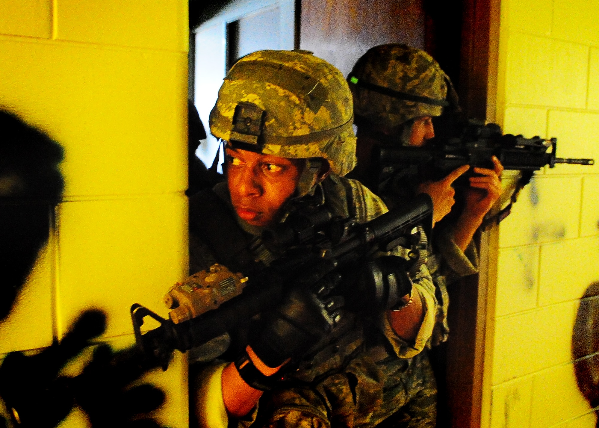 Day four and five of the QRT training, August 12-13, rigorous physical training continued as obstacles increased with difficulty testing not only their strength but also their capabilities to act as a cohesive squad. Day four, SF Airmen were taught how to respond to an active shooter and/or hostage scenario in the Base Exchange and the base dormitories, as well as extraction of an active shooter in a vehicle. Day five SF Airmen performed combative training and practical exercises. Physical training sessions were themed in memory of the 31 warriors lost in Afghanistan, August 7, 2011, by each volunteer completing 31 of each exercise throughout the course. A QRT member provides immediate response to any high risk situation on Osan Air Base to include barricaded suspects, workplace violence, domestic violence and abuse response, school violence, and disaster response. (Photo by Staff Sgt. Daylena Gonzalez)  