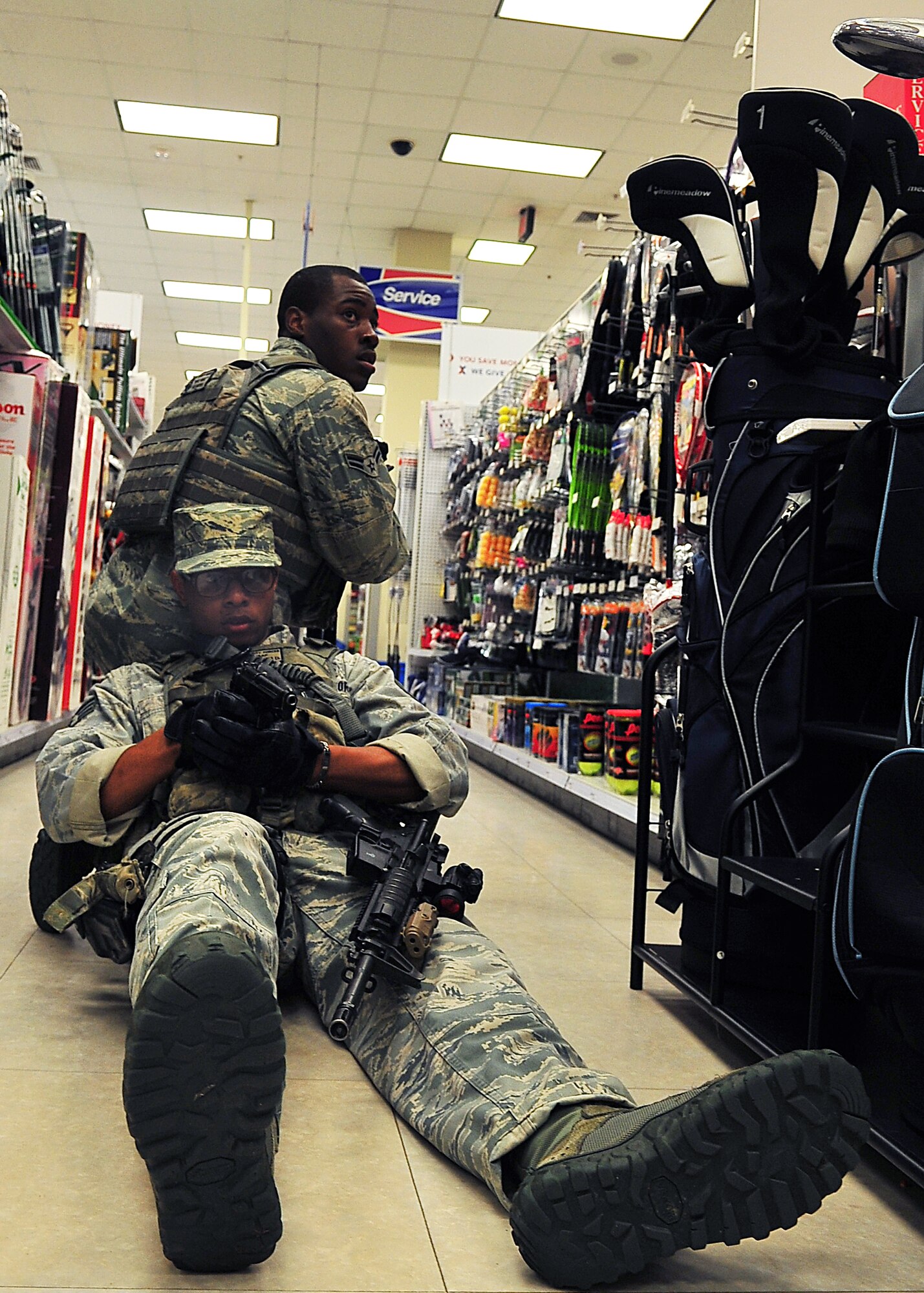 Day four and five of the QRT training, August 12-13, rigorous physical training continued as obstacles increased with difficulty testing not only their strength but also their capabilities to act as a cohesive squad. Day four, SF Airmen were taught how to respond to an active shooter and/or hostage scenario in the Base Exchange and the base dormitories, as well as extraction of an active shooter in a vehicle. Day five SF Airmen performed combative training and practical exercises. Physical training sessions were themed in memory of the 31 warriors lost in Afghanistan, August 7, 2011, by each volunteer completing 31 of each exercise throughout the course. A QRT member provides immediate response to any high risk situation on Osan Air Base to include barricaded suspects, workplace violence, domestic violence and abuse response, school violence, and disaster response. (Photo by Staff Sgt. Daylena Gonzalez)  
