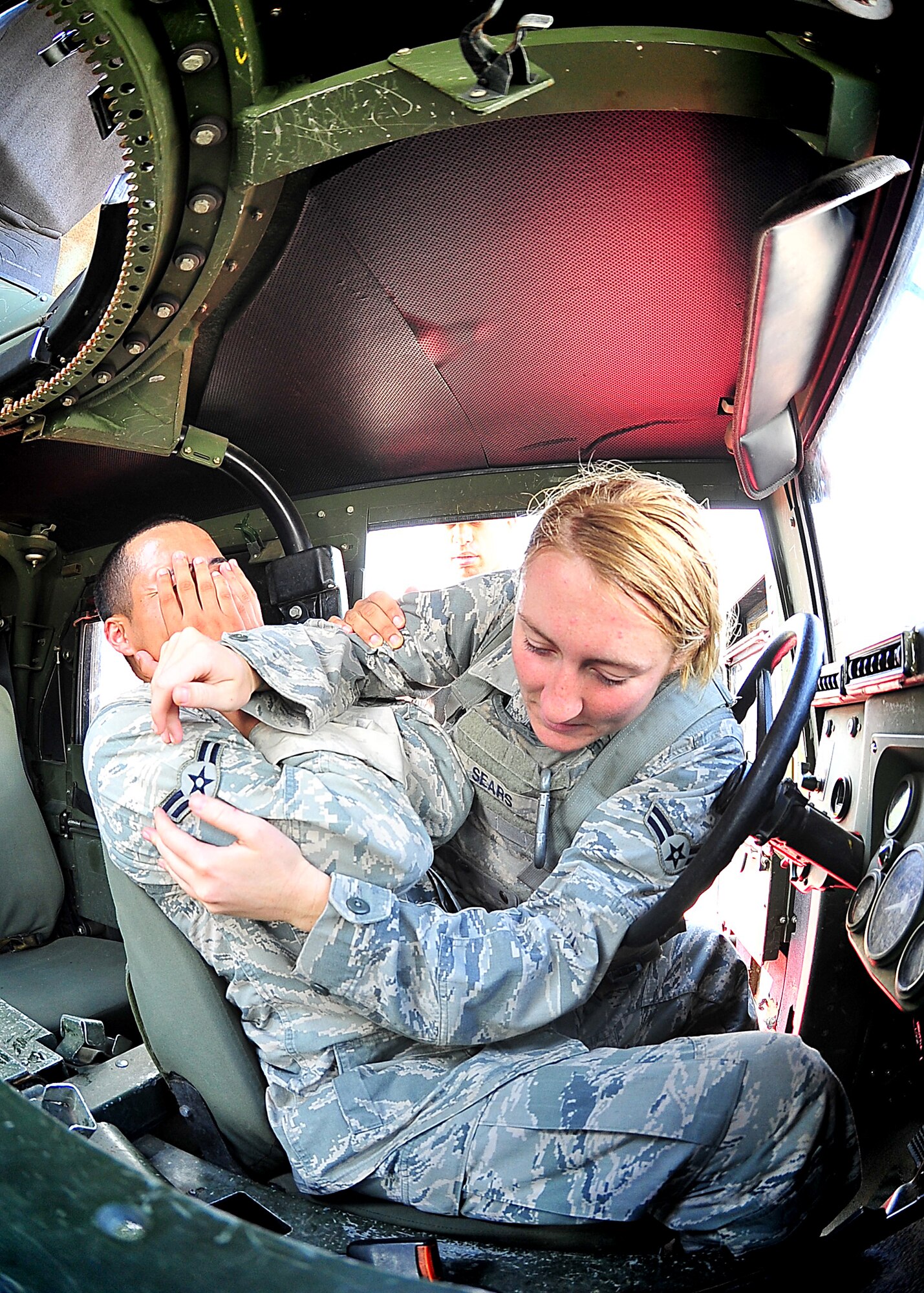 Day four and five of the QRT training, August 12-13, rigorous physical training continued as obstacles increased with difficulty testing not only their strength but also their capabilities to act as a cohesive squad. Day four, SF Airmen were taught how to respond to an active shooter and/or hostage scenario in the Base Exchange and the base dormitories, as well as extraction of an active shooter in a vehicle. Day five SF Airmen performed combative training and practical exercises. Physical training sessions were themed in memory of the 31 warriors lost in Afghanistan, August 7, 2011, by each volunteer completing 31 of each exercise throughout the course. A QRT member provides immediate response to any high risk situation on Osan Air Base to include barricaded suspects, workplace violence, domestic violence and abuse response, school violence, and disaster response. (Photo by Staff Sgt. Daylena Gonzalez)  