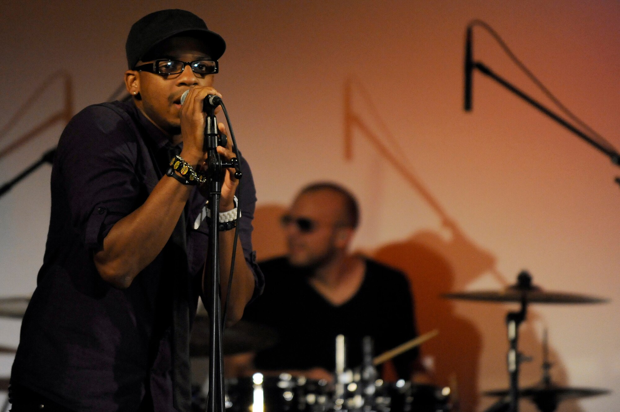 MISAWA AIR BASE, Japan -- Jimmie Allen, American Idol season 10 contestant, sings during a live performance at the Richard Bong Training Facility Aug. 12. Eight American Idol contestants performed for military members and their families during two free concerts over the weekend. (U.S. Air Force photo/Tech. Sgt. Marie Brown)