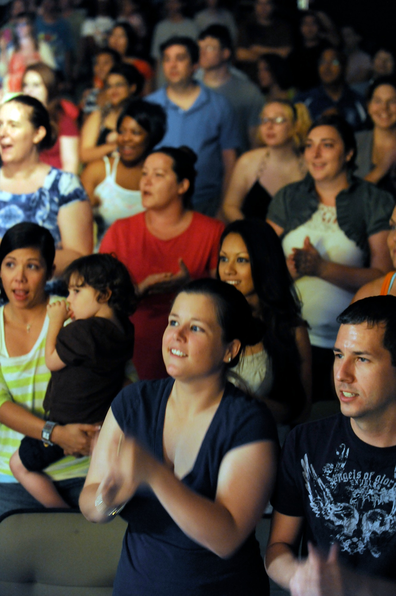 MISAWA AIR BASE, Japan -- Members of the Misawa community clapped and sung along with songs performed at the Richard Bong Training Facility Aug. 12. Misawa community had an opportunity to attend one of two free concerts over the weekend. (U.S. Air Force photo/Tech. Sgt. Marie Brown)