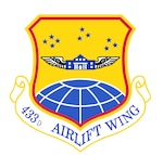 433rd Airlift Wing shield with Black trim on wings in full color. (U.S. Air Force graphic)