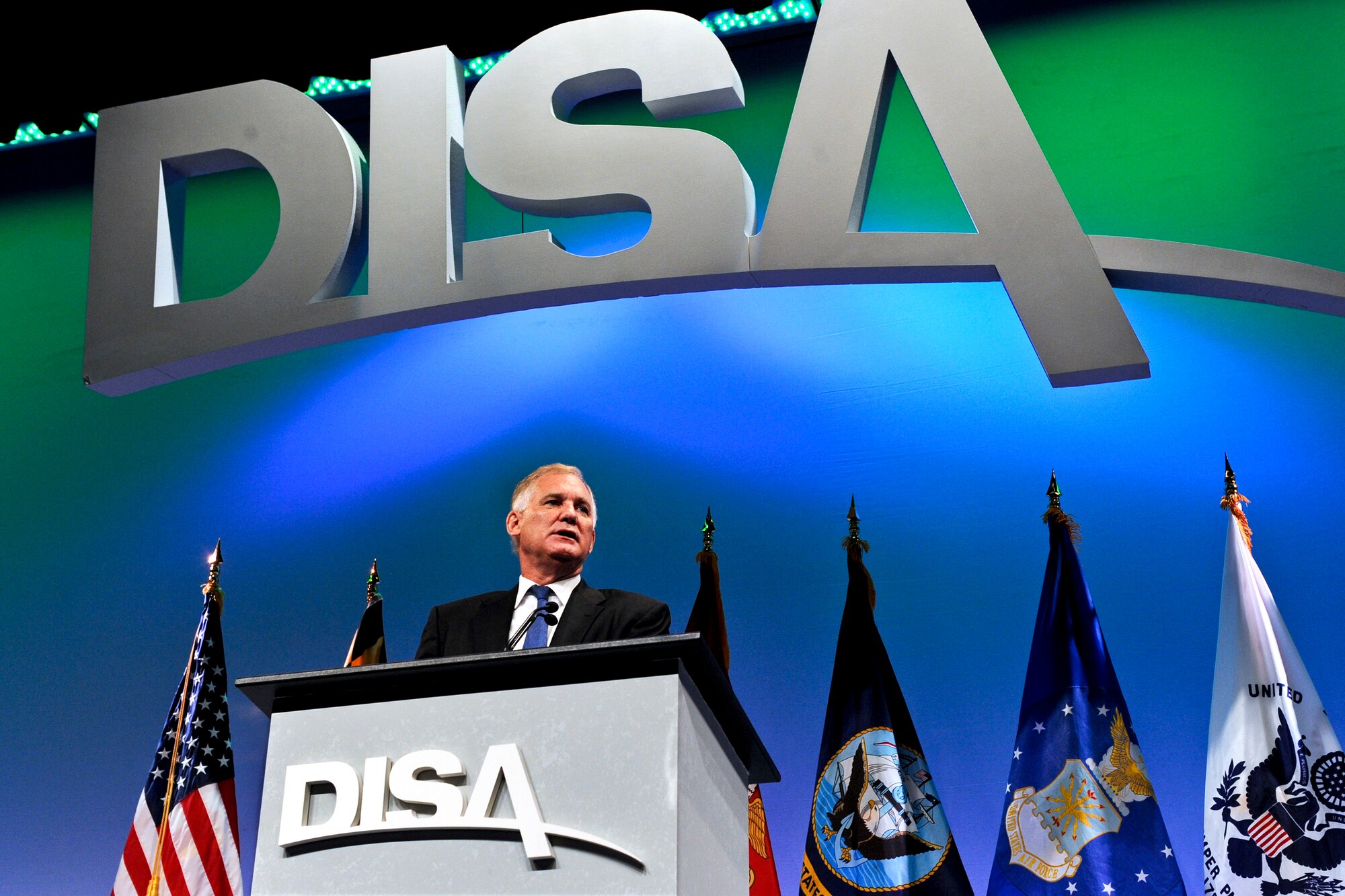 Deputy Defense Secretary William J. Lynn III addresses about 2,700 participants at the Defense Information Systems Agency's Customer and Industry Forum at the Baltimore Convention Center in Baltimore Aug. 16, 2011. Lynn discussed the threats of cyber warfare in the digital age. (Defense Department photo/R.D. Ward)