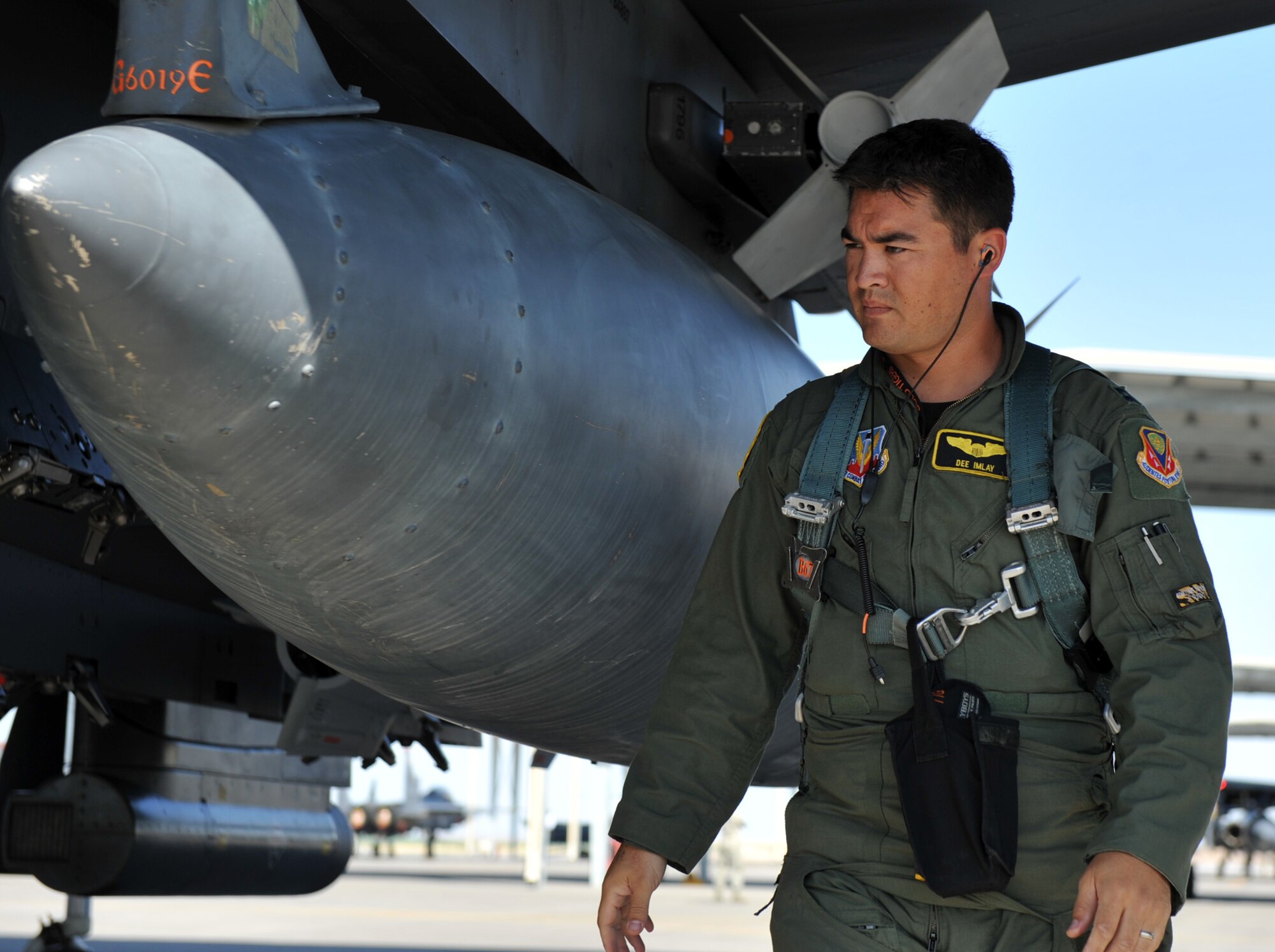 MOUNTAIN HOME AIR FORCE BASE, Idaho - Capt. Francis Imlay, 391st Fighter Squadron pilot, does a pre-flight inspection on an F-15E Strike Eagle here Aug 8. The weapons testing program is part of the Air Force’s ongoing effort to test weapons systems in training missions that also prepare aircrews for upcoming deployments. (U.S. Air Force photo by Airman 1st Class Heather Hayward)