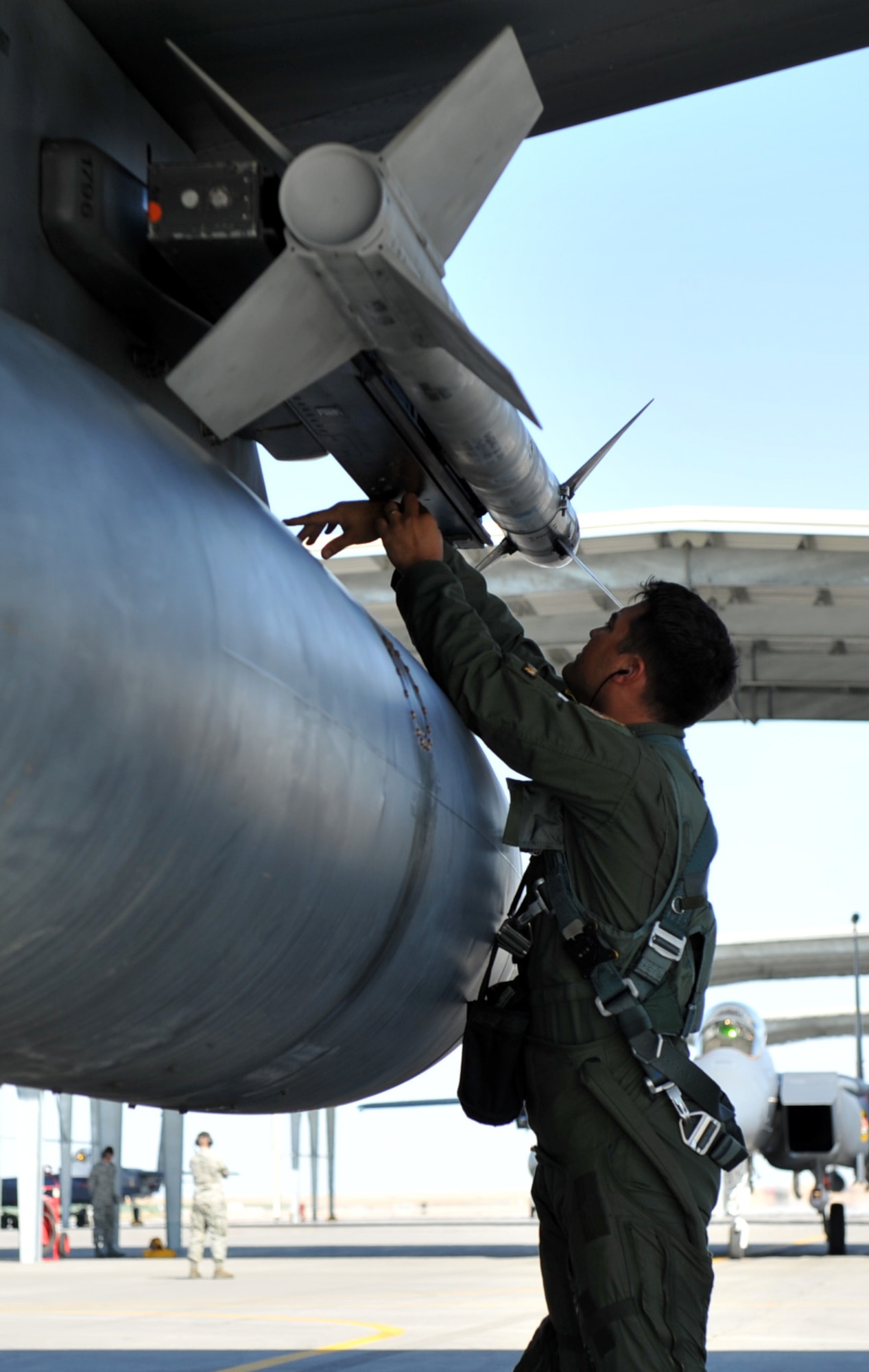 MOUNTAIN HOME AIR FORCE BASE, Idaho – Capt. Francis Imlay, 391st Fighter Squadron pilot, does a pre-flight inspection on an F-15E Strike Eagle here Aug 8. A total of 10 F-15E Strike Eagles were part of the Combat Hammer exercise. (U.S. Air Force photo by Airman 1st Class Heather Hayward)