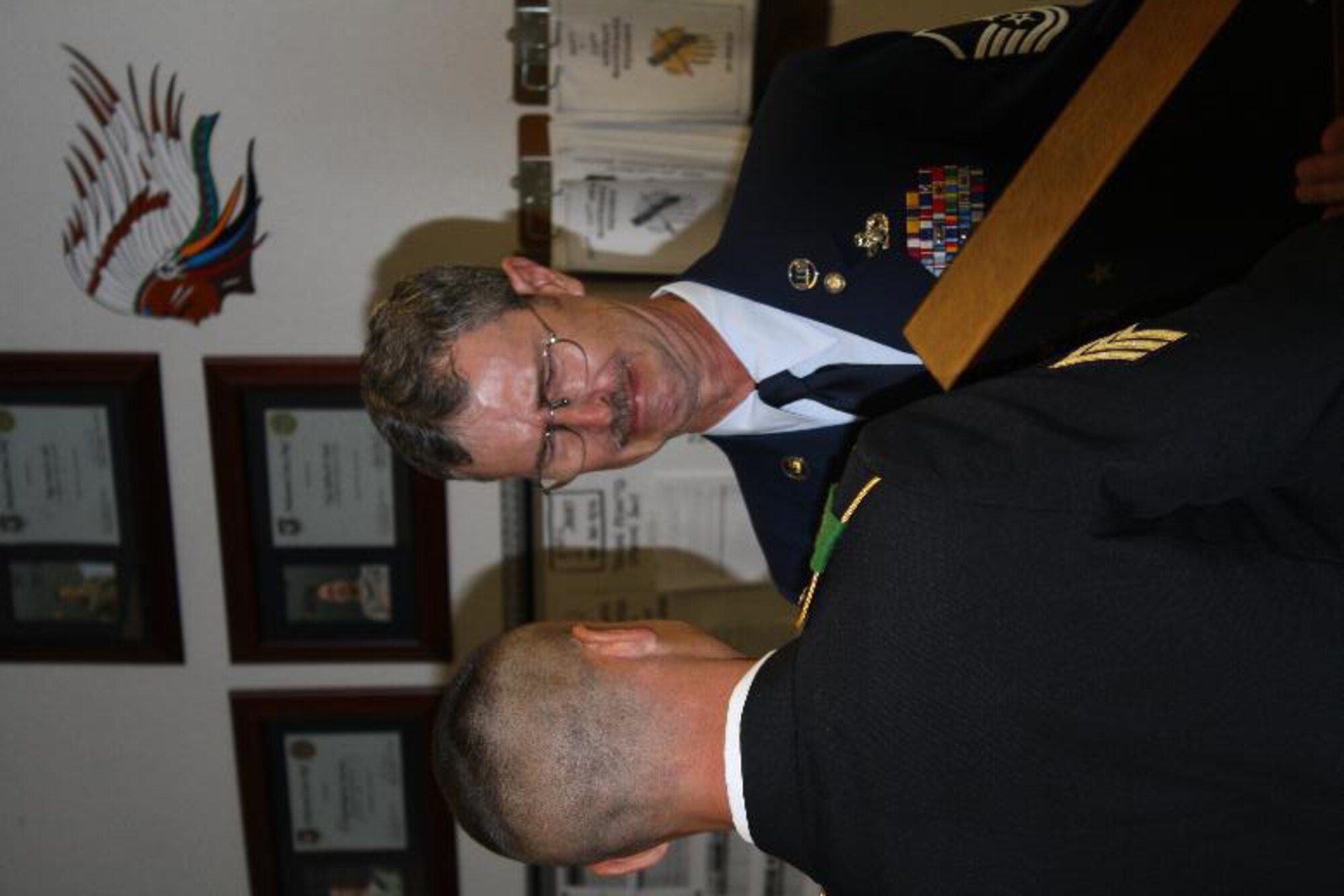 Master Sgt. Wayne Ellison, from the 507th Air Refueling Wing Maintenance Squadron received a surprise August 6 during his 30-year retirement ceremony.  His son, Jay, a Sgt. in the Army National Guard had been granted leave from his deployment in the southwest asia theater to return in order to present his father with his retirement flag.