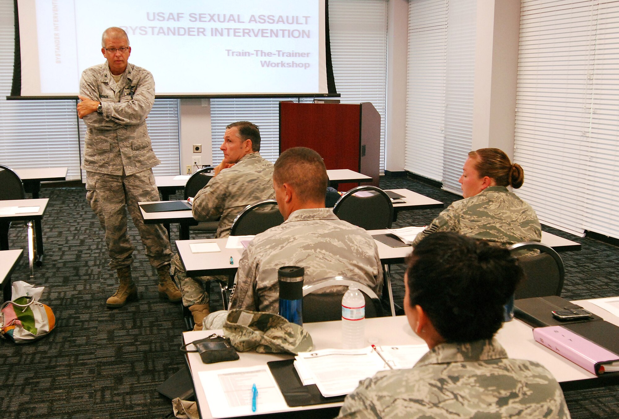 Col. Tim Tarchick, 94th Airlift Wing commander, talks with students attending the SAPR (Sexual Assault Prevention and Response) program's Bystander Intervention Train the Trainer course at Dobbins ARB, Aug 16.  Students came from Carlswell Joint Reserve Base, Grissom ARB, Niagara ARS, Moody AFB, and Pope AFB and will return to train personnel at their locations.  (U.S. Air Force photo/ Brad Fallin)