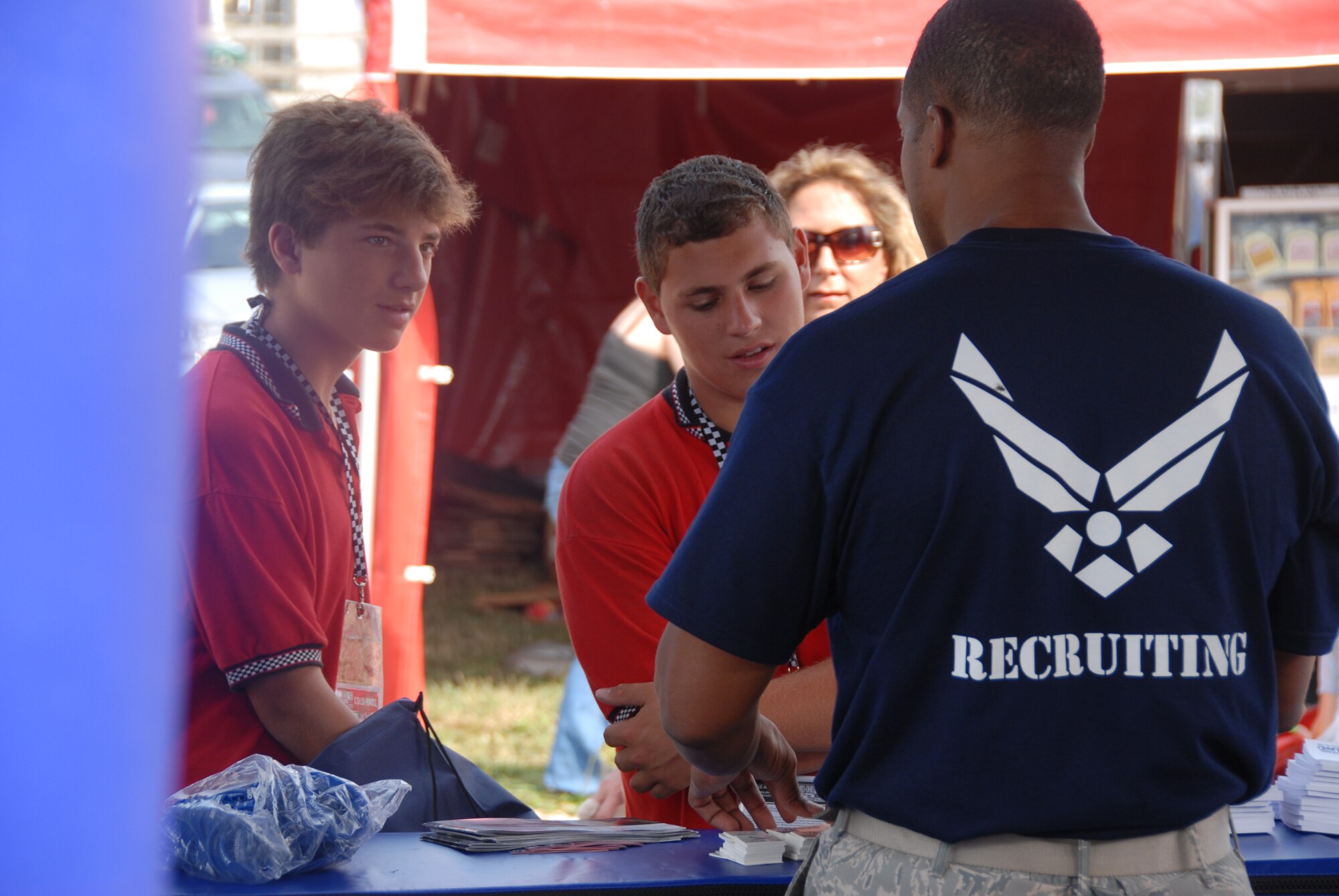 LEXINGTON, Ohio -- Recruiters from the 179th Airlift Wing, 178th Fighter Wing and 200th Red Horse Squadron were representing the Ohio Air National Guard August 5 through 7 at the Mid-Ohio Raceway. The recruiters were present to promote the Ohio Air National guard, pass out information to potential recruits and interact with race fans to inform them of all the great things the ANG has to offer. The Air National Guard had their 30-foot mobile recruiting trailer set up, "which incorporates as much about the Ohio ANG units as possible. It's literally a 30-foot billboard and it has gotten us a lot of attention," said Master Sgt. Dana Togliatti, Recruiting office supervisor for the 179th AW. (U.S. Air Force photo by Staff Sgt Robert Koehler/Released)